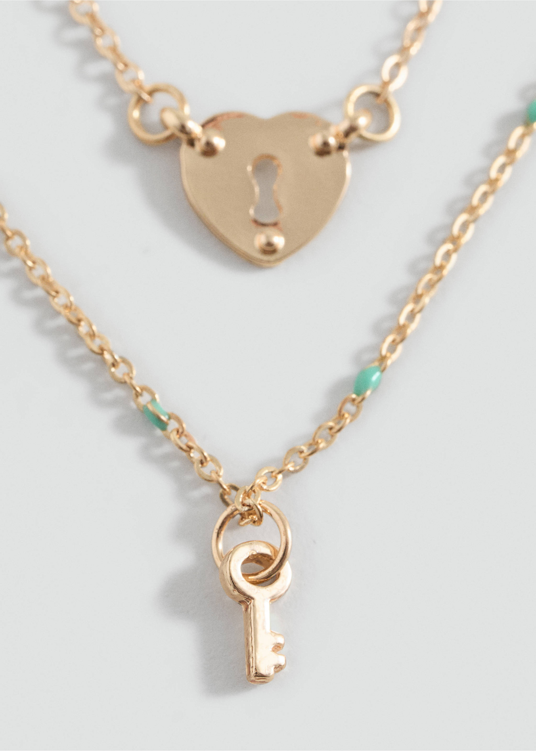 Pack 2 kombinerade halsband - Bild av mittparti, Guld. Ref: 27021212-00.