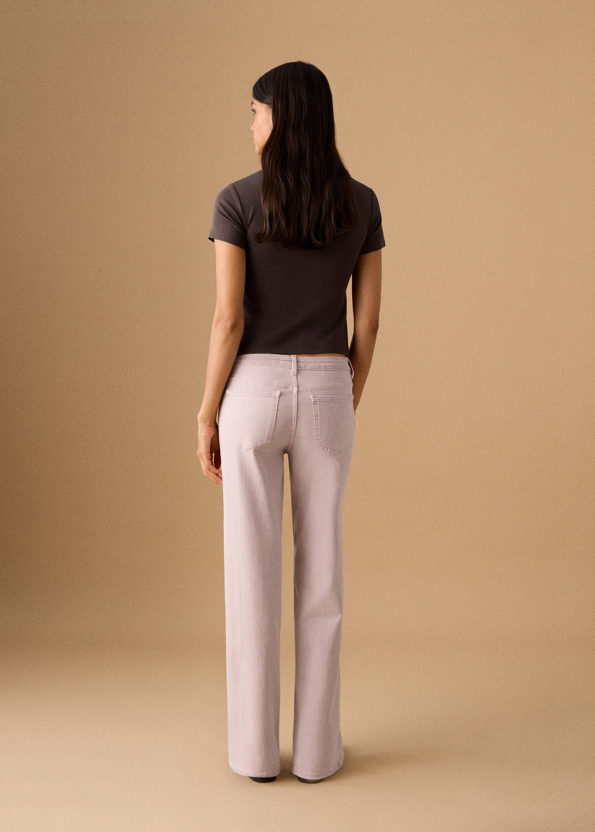 Low-waist studded jeans - Reverse of the article