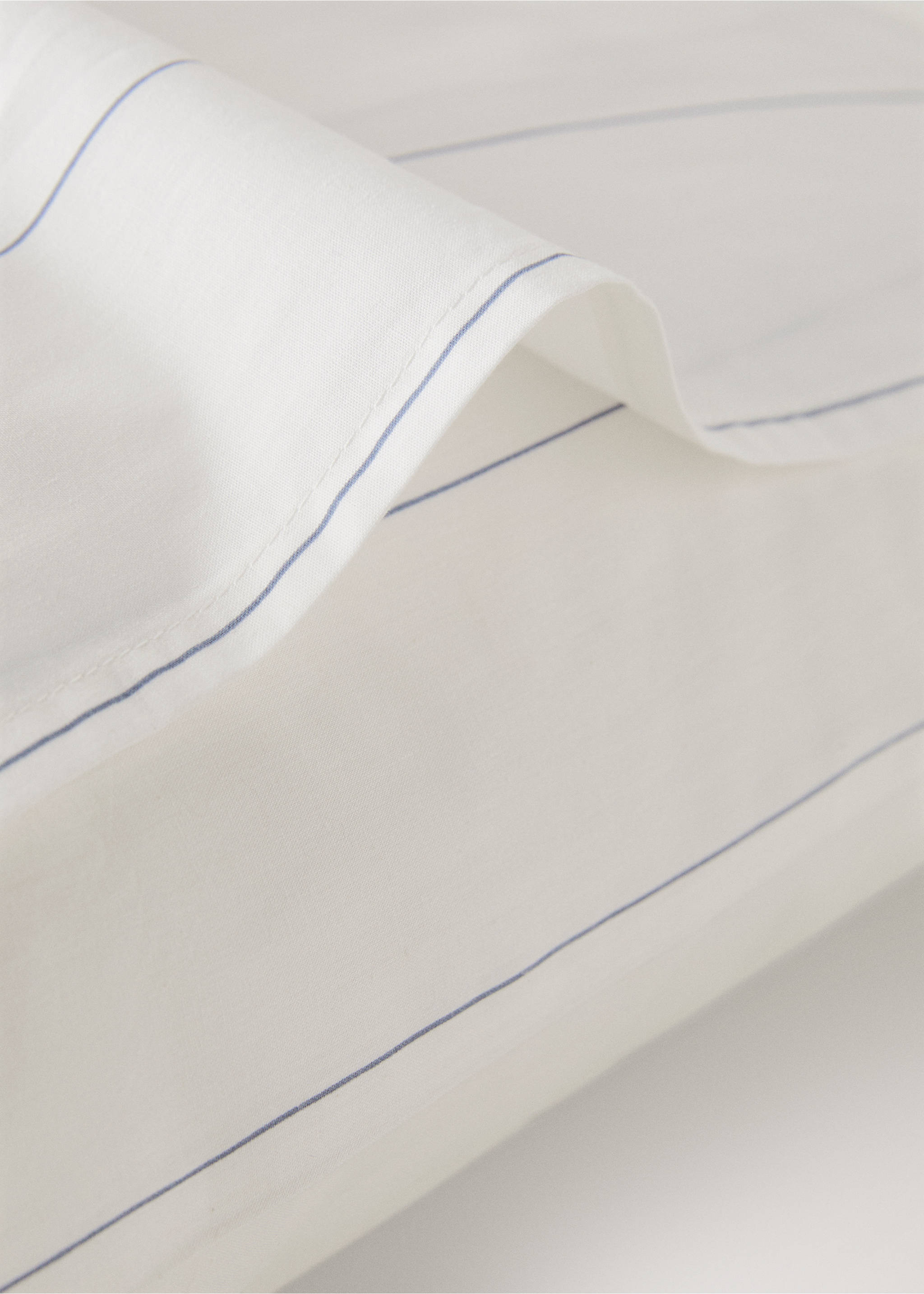 Two 100% cotton reversible striped pillowcases 60x60 cm - Details of the article 2, Blue. Ref: 27023289-00.