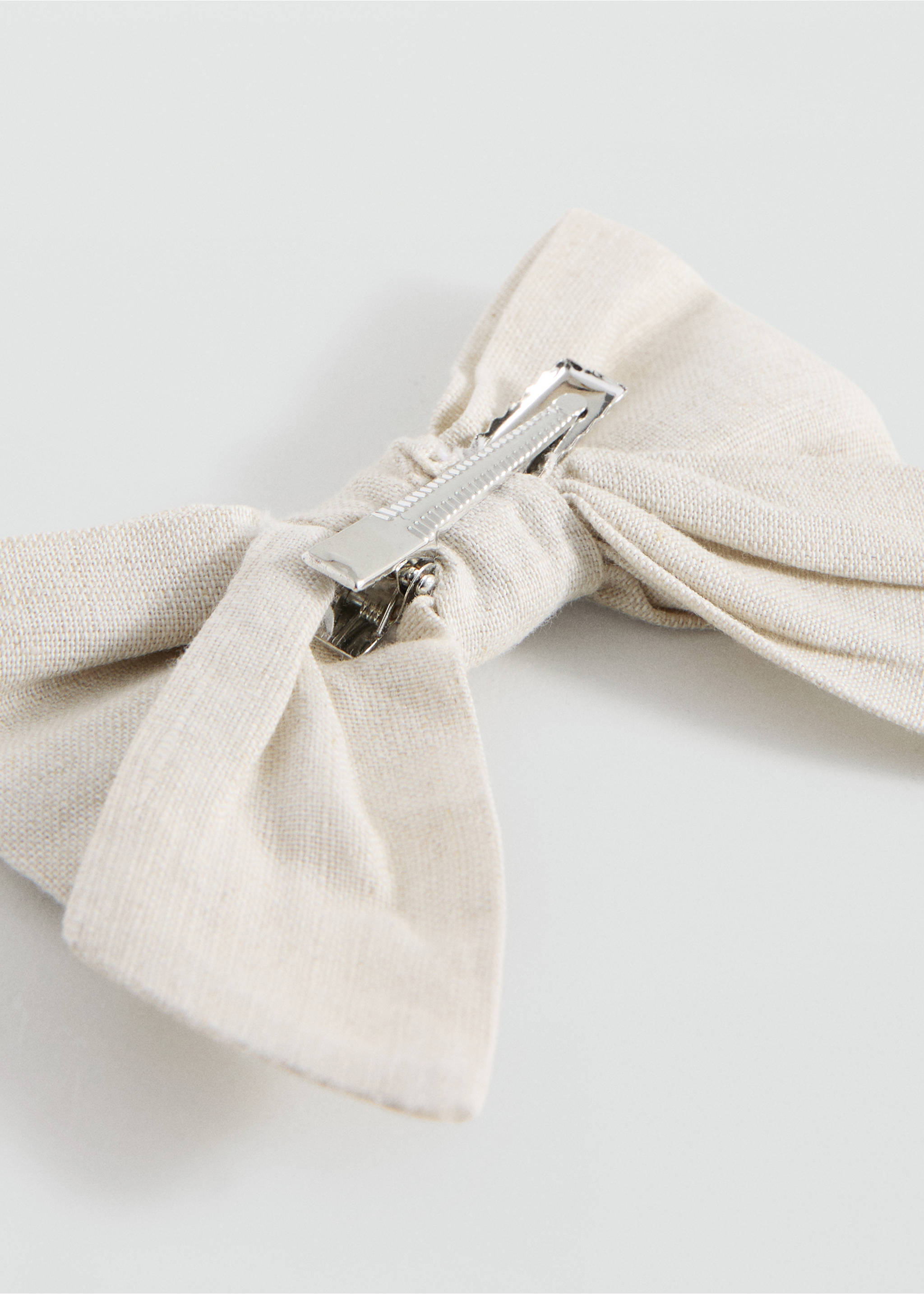 Pasador pelo lazo - Plano medio, Arena. Ref: 27023730-00.