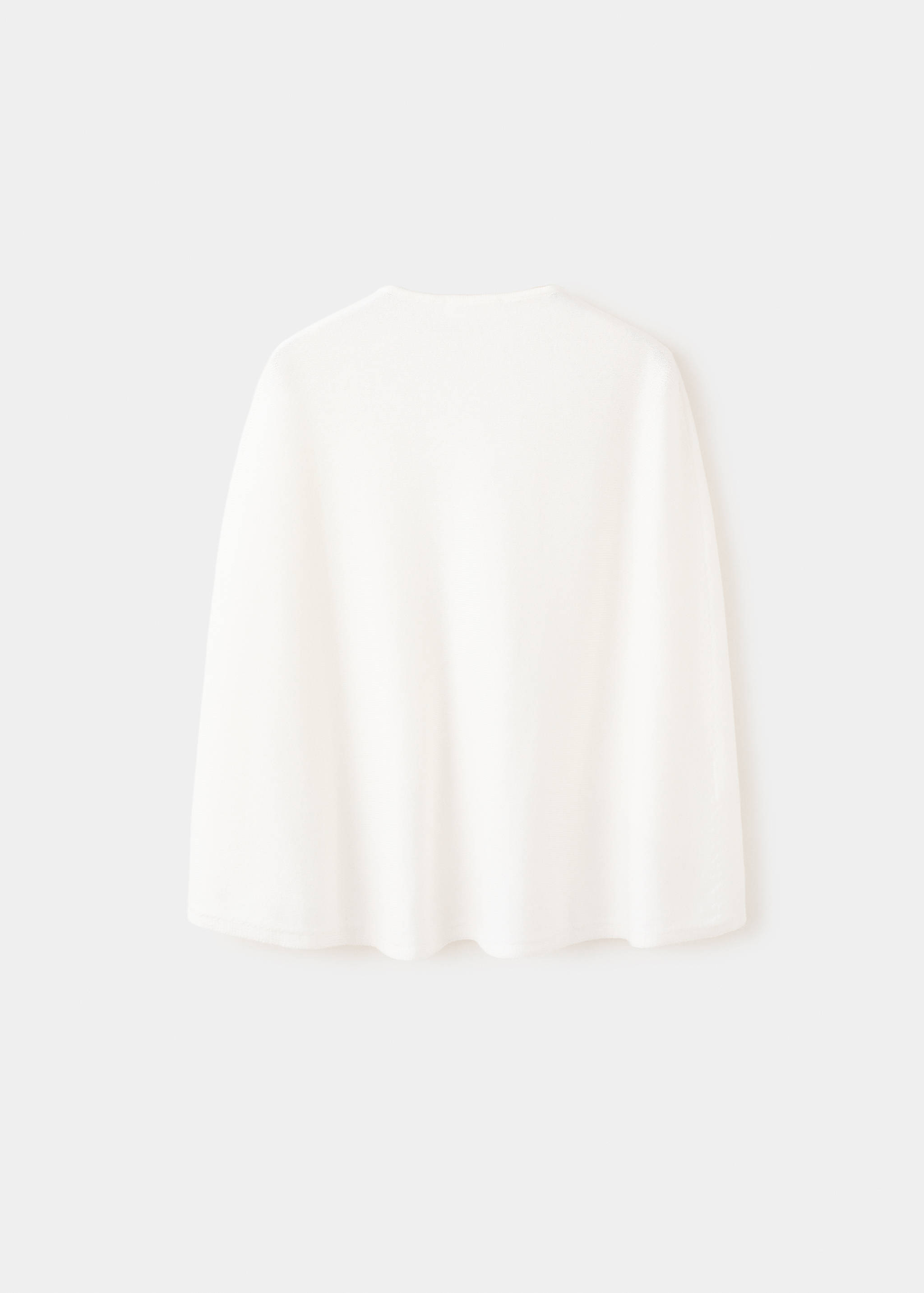 Knitted cape with lace details - Reverse of the article