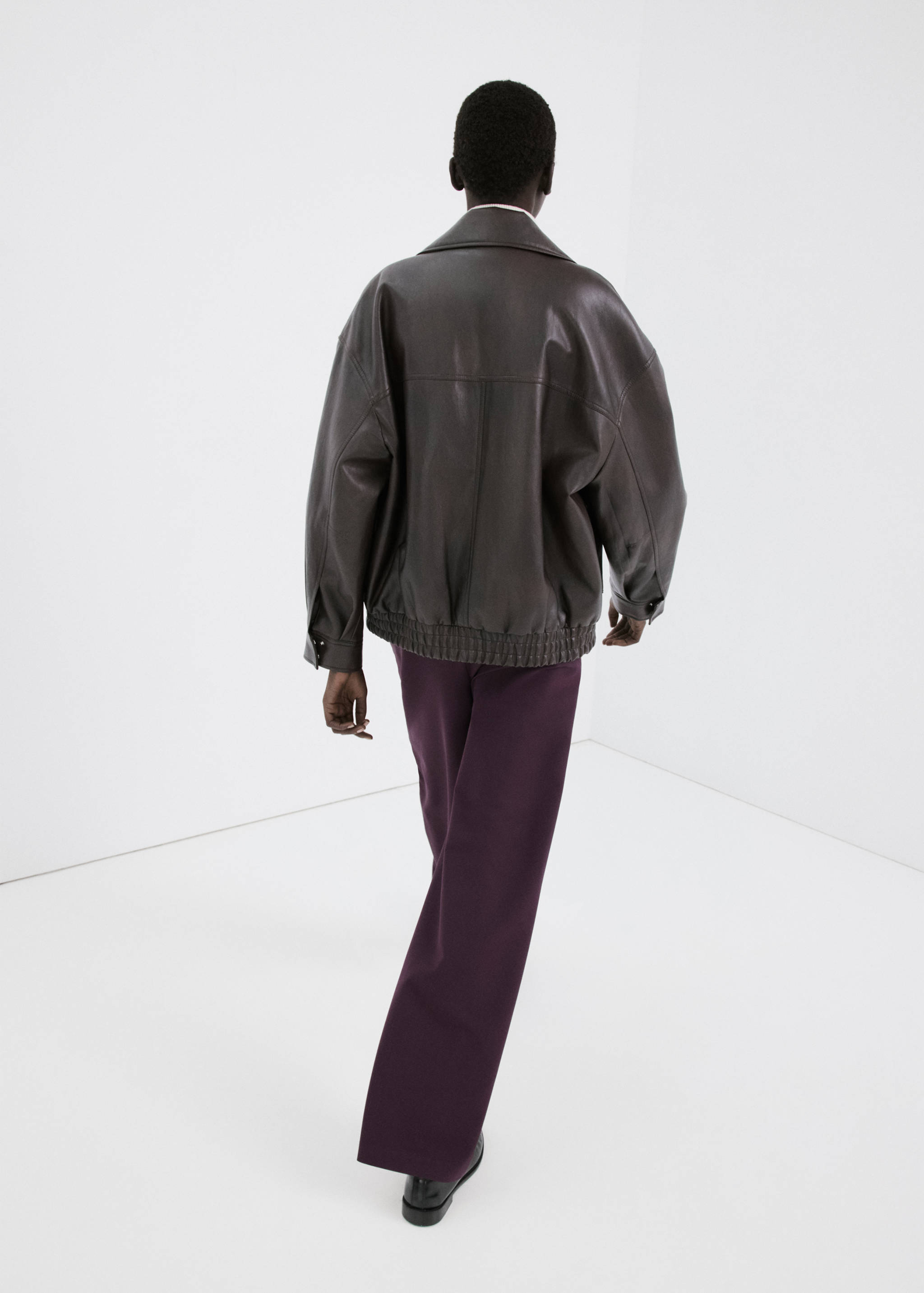 Combined striped trousers - Reverse of the article