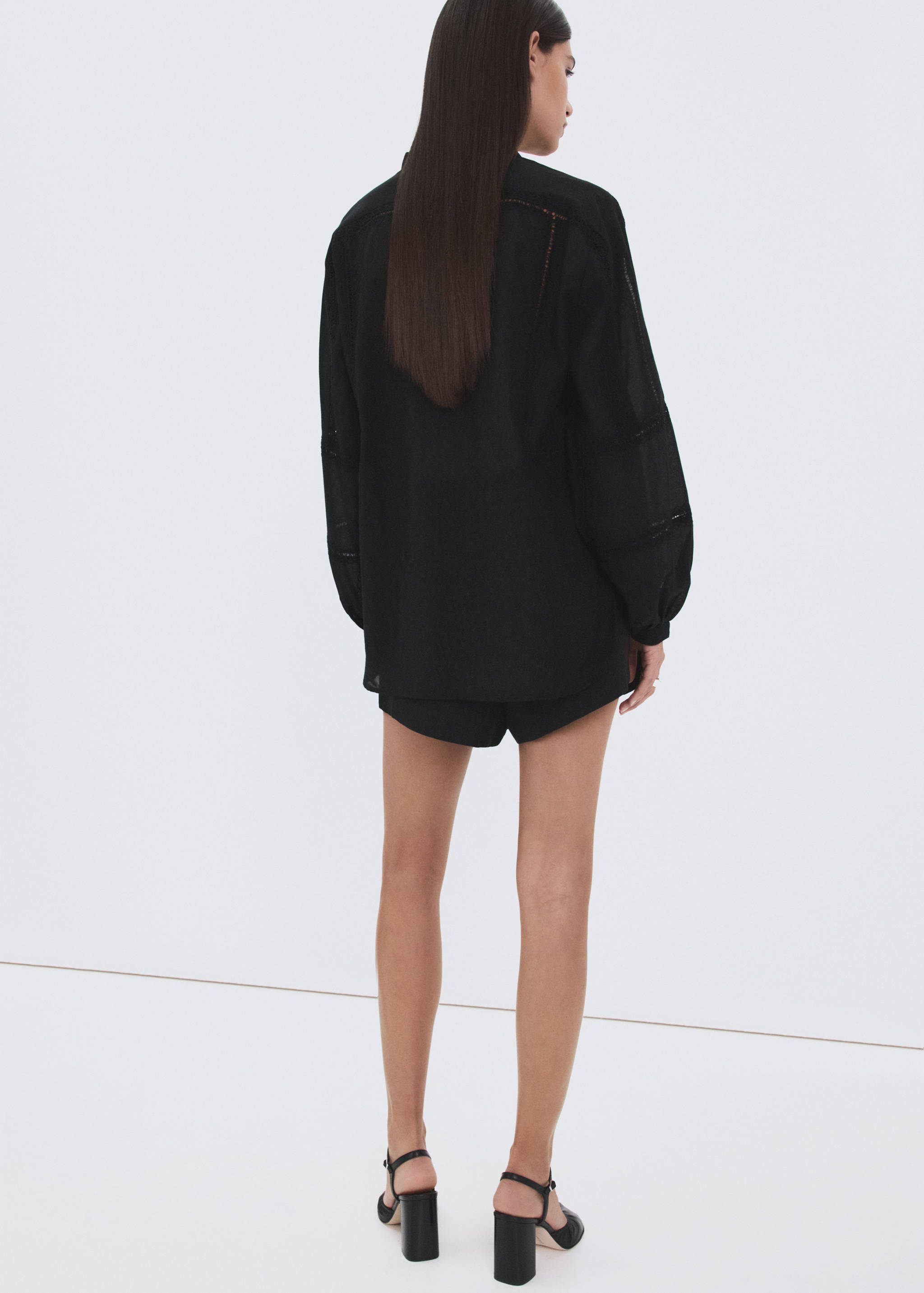 Embroidered openwork blouse - Reverse of the article