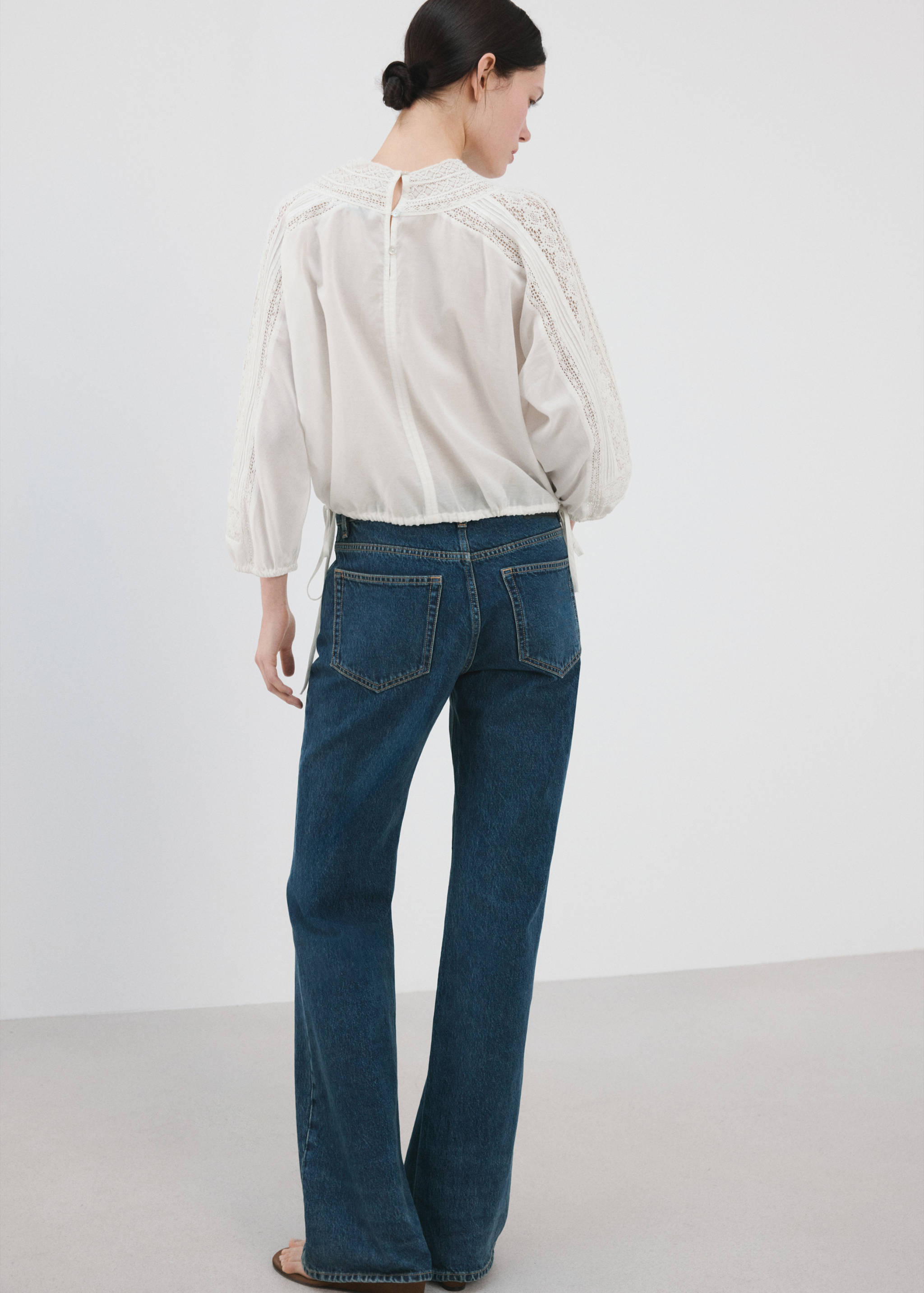 Embroidered openwork blouse - Reverse of the article