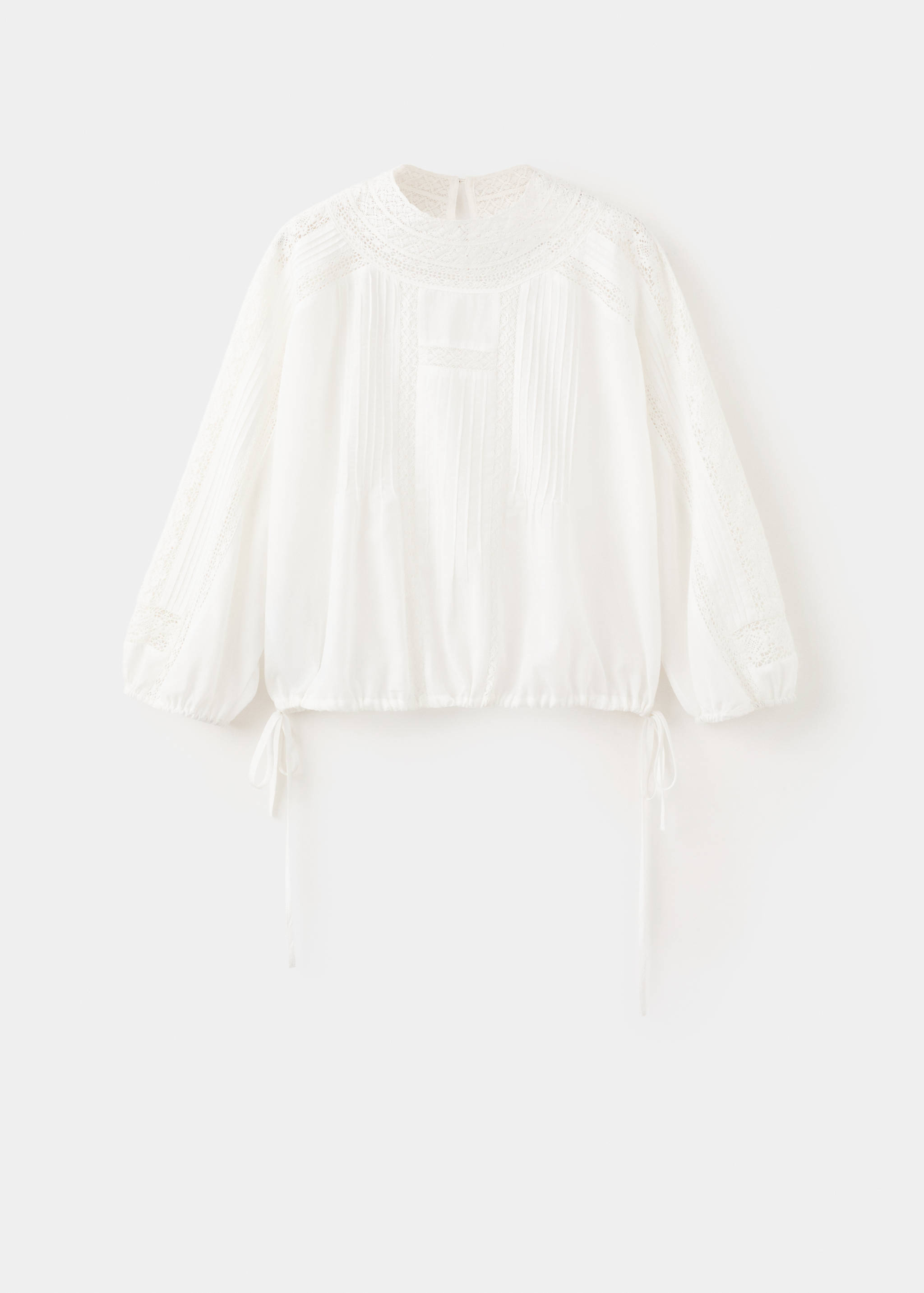 Embroidered openwork blouse - Article without model