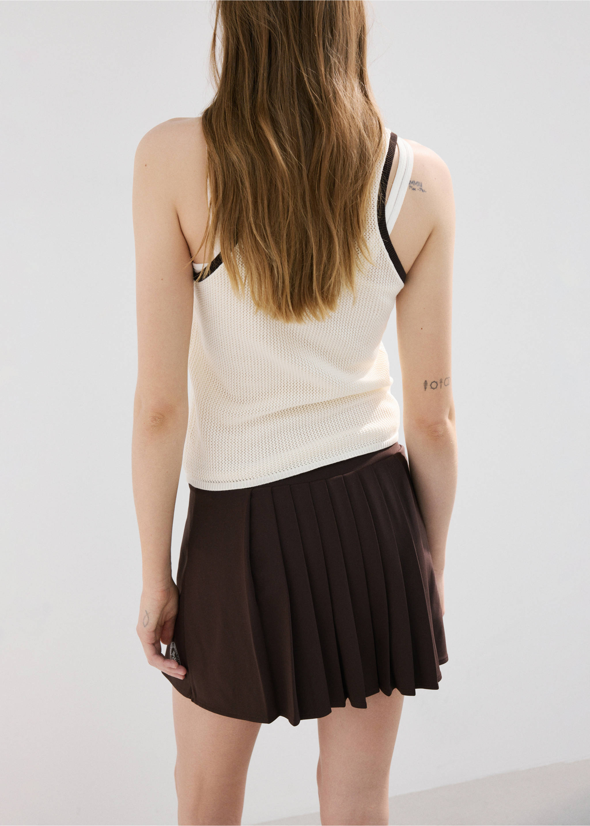 Pleated skirt with printed logo - Reverse of the article, Brown. Ref: 27027165-00.
