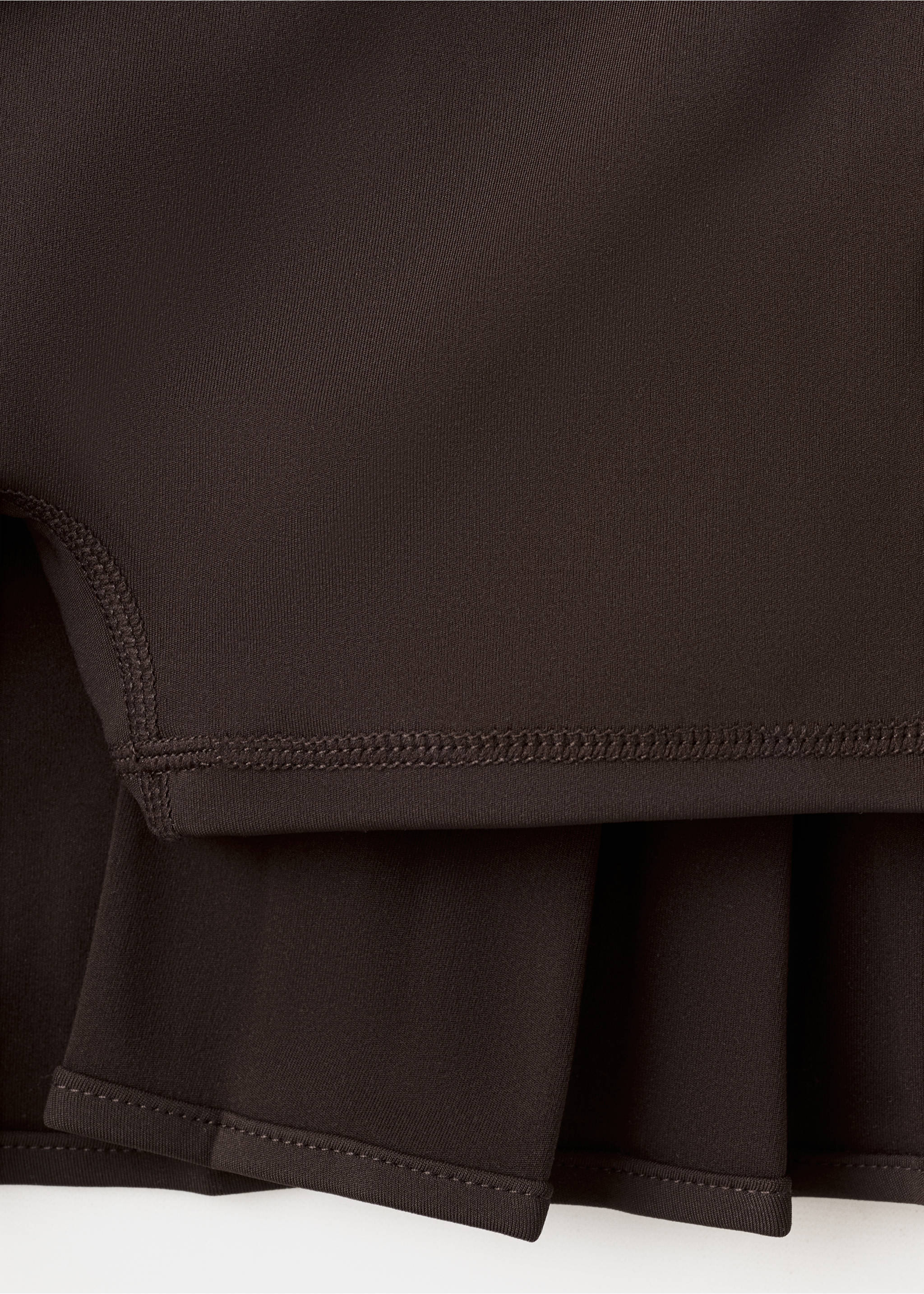 Pleated skirt with printed logo - Details of the article 0, Brown. Ref: 27027165-00.