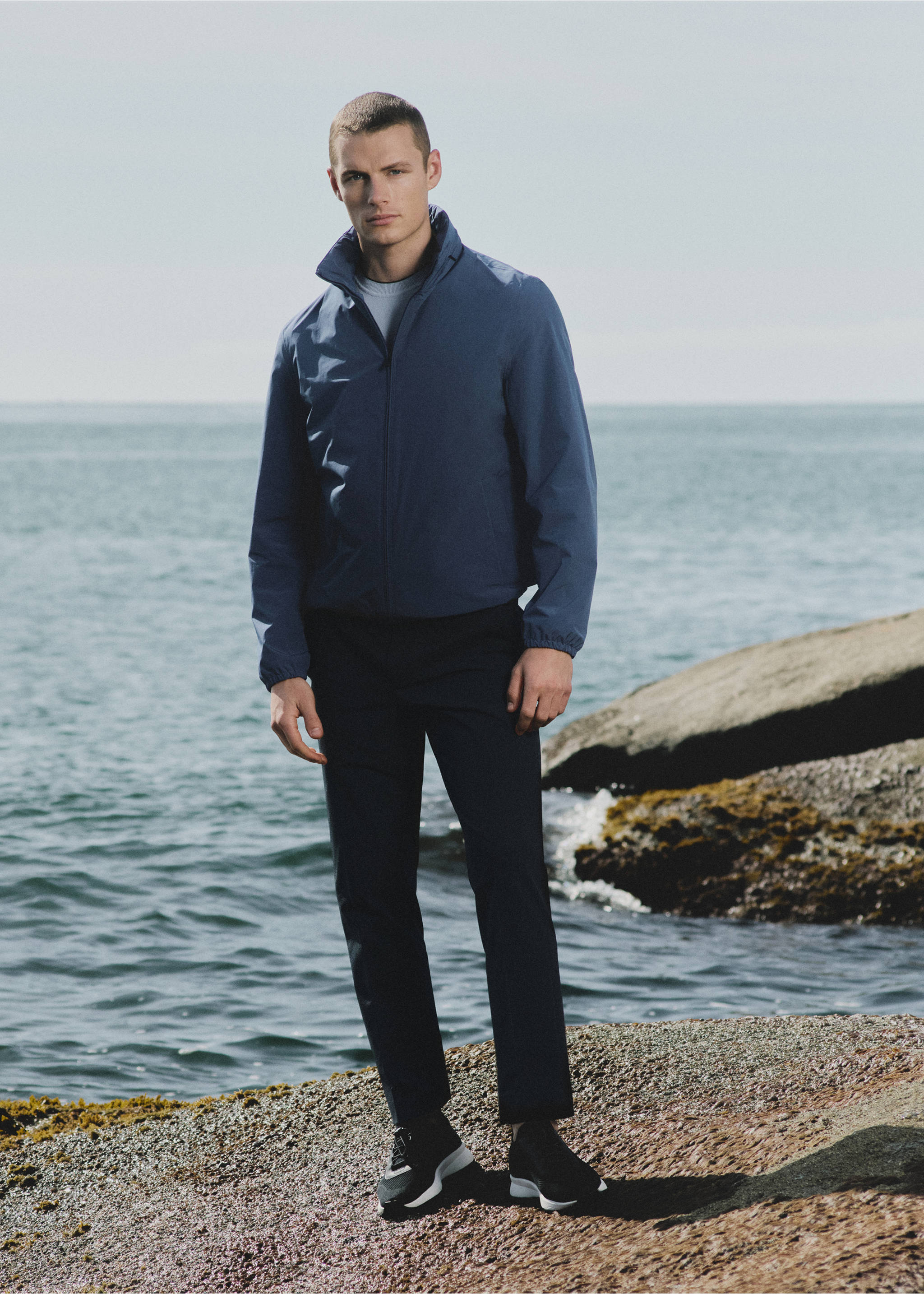 Stretch-fabric slim-fit trousers - Details of the article 5, Navy. Ref: 27027898-00.