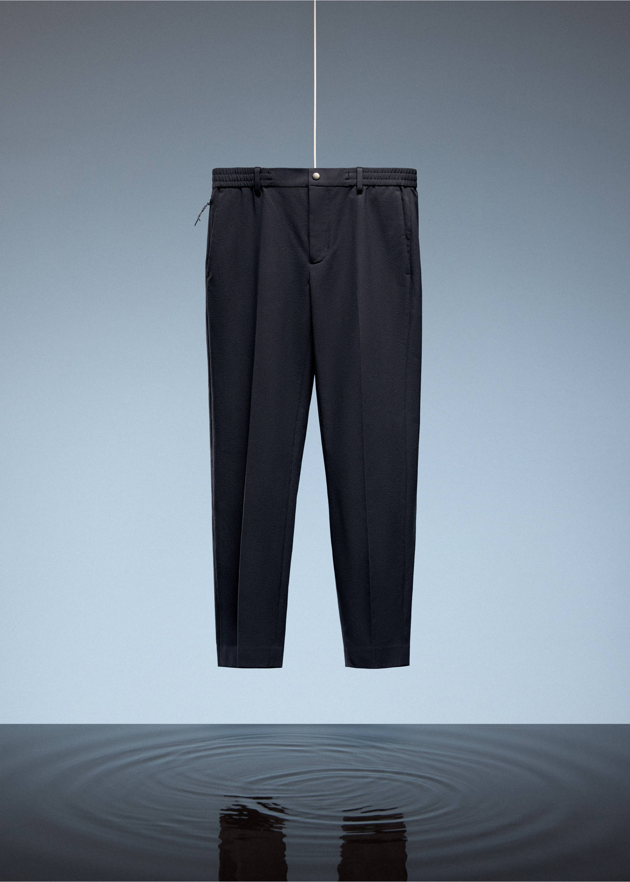 Stretch-fabric slim-fit trousers - Details of the article 9, Navy. Ref: 27027898-00.