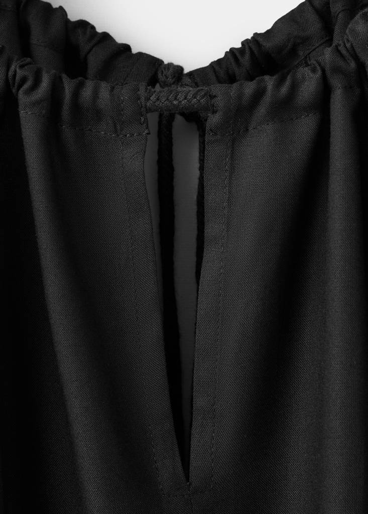 Halter top with ruffled detail — Black