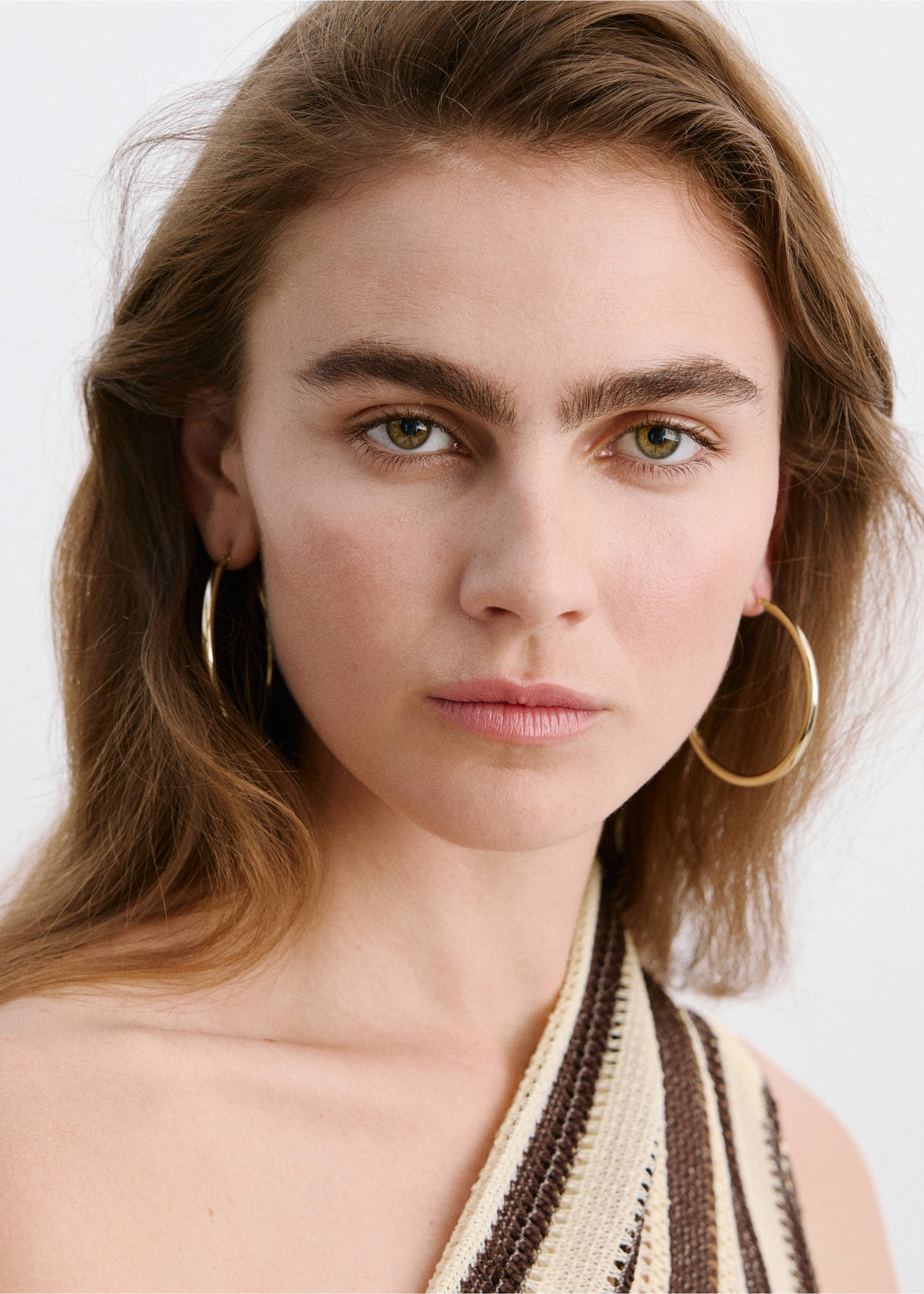 Striped asymmetrical top - Details of the article 1, Brown. Ref: 27029060-00.