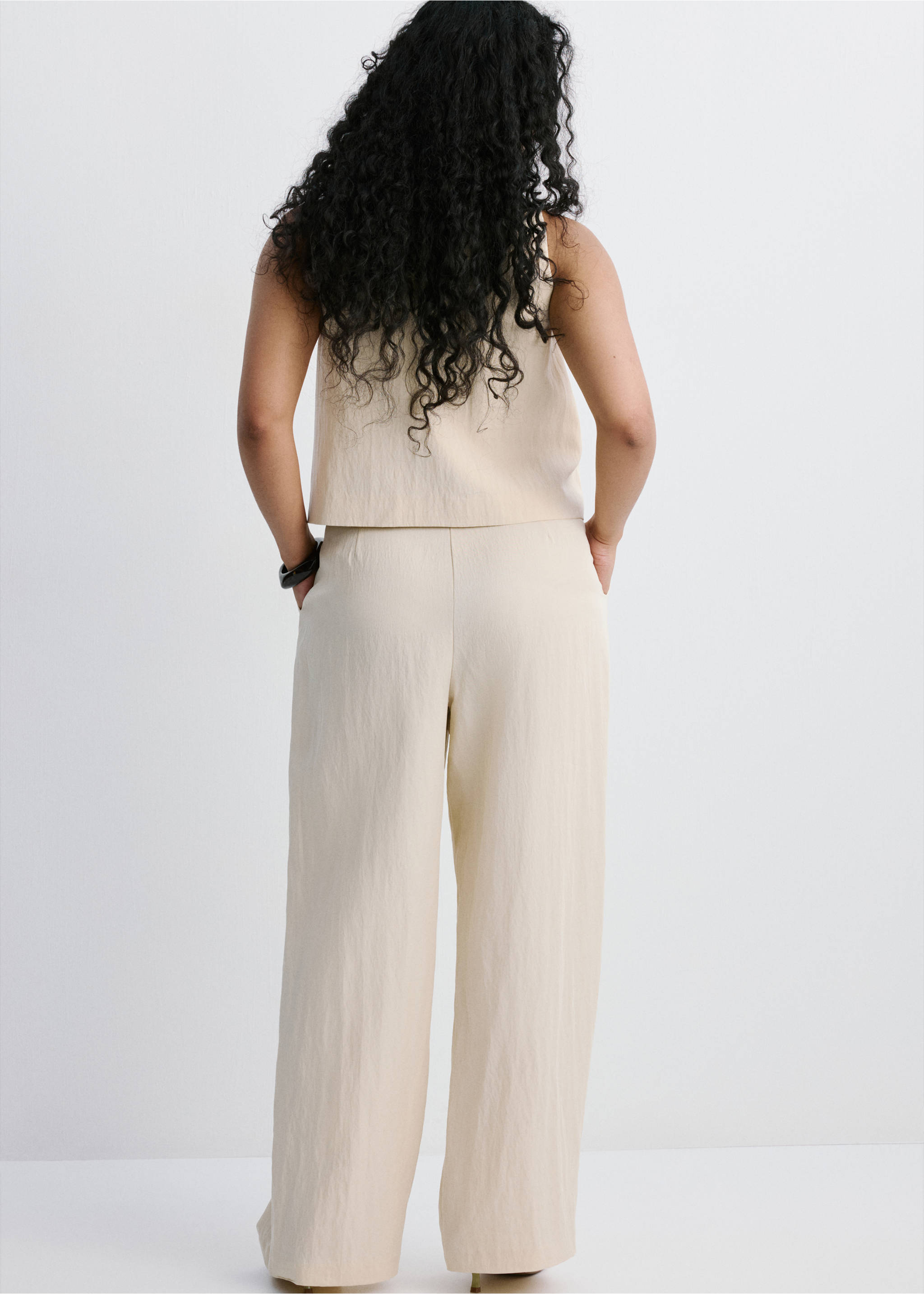 Mid-rise lyocell trousers - Details of the article 4, Light/Pastel Grey. Ref: 27029064-00.
