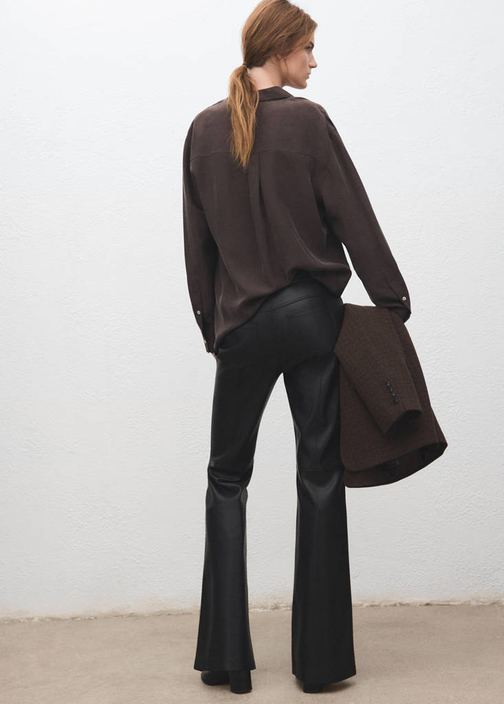 Faux-leather flared trousers — Black