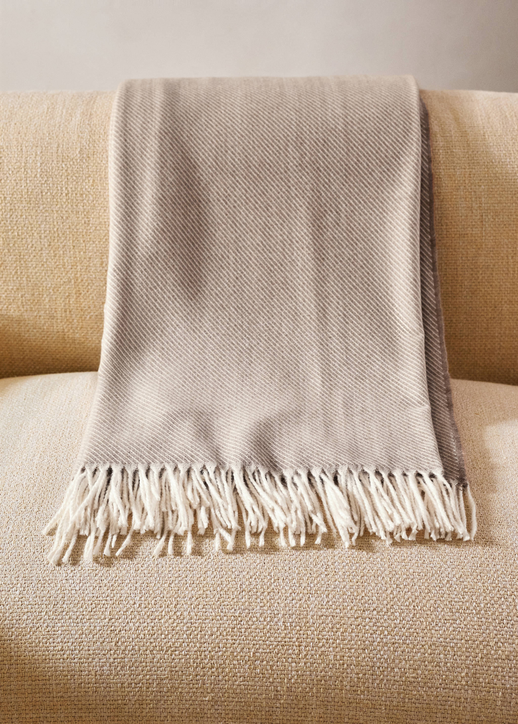 Soft throw with striped design and fringe detail - General plane