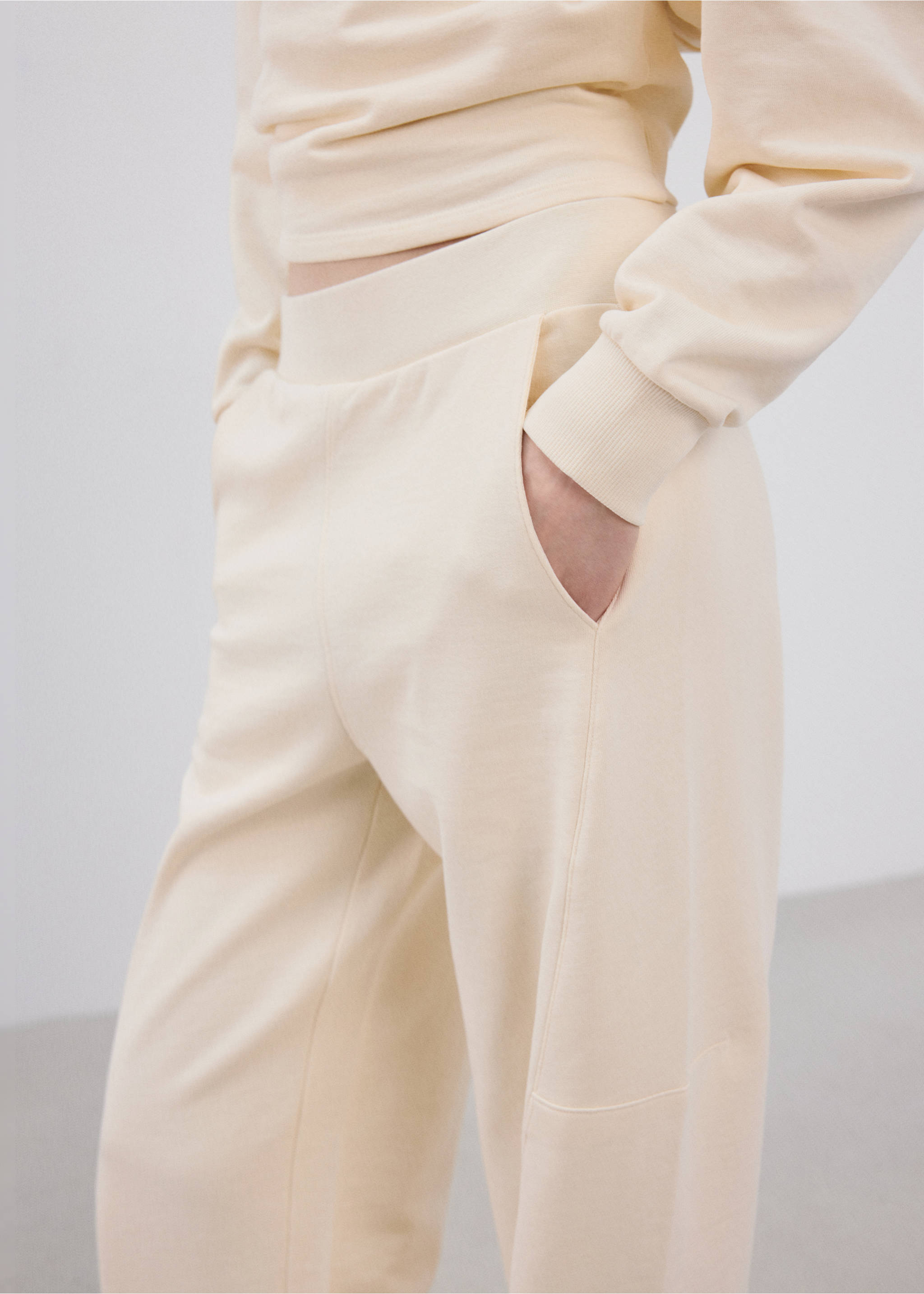 Elastic waist cotton trousers - Details of the article 1, Pastel Yellow. Ref: 27033336-01.