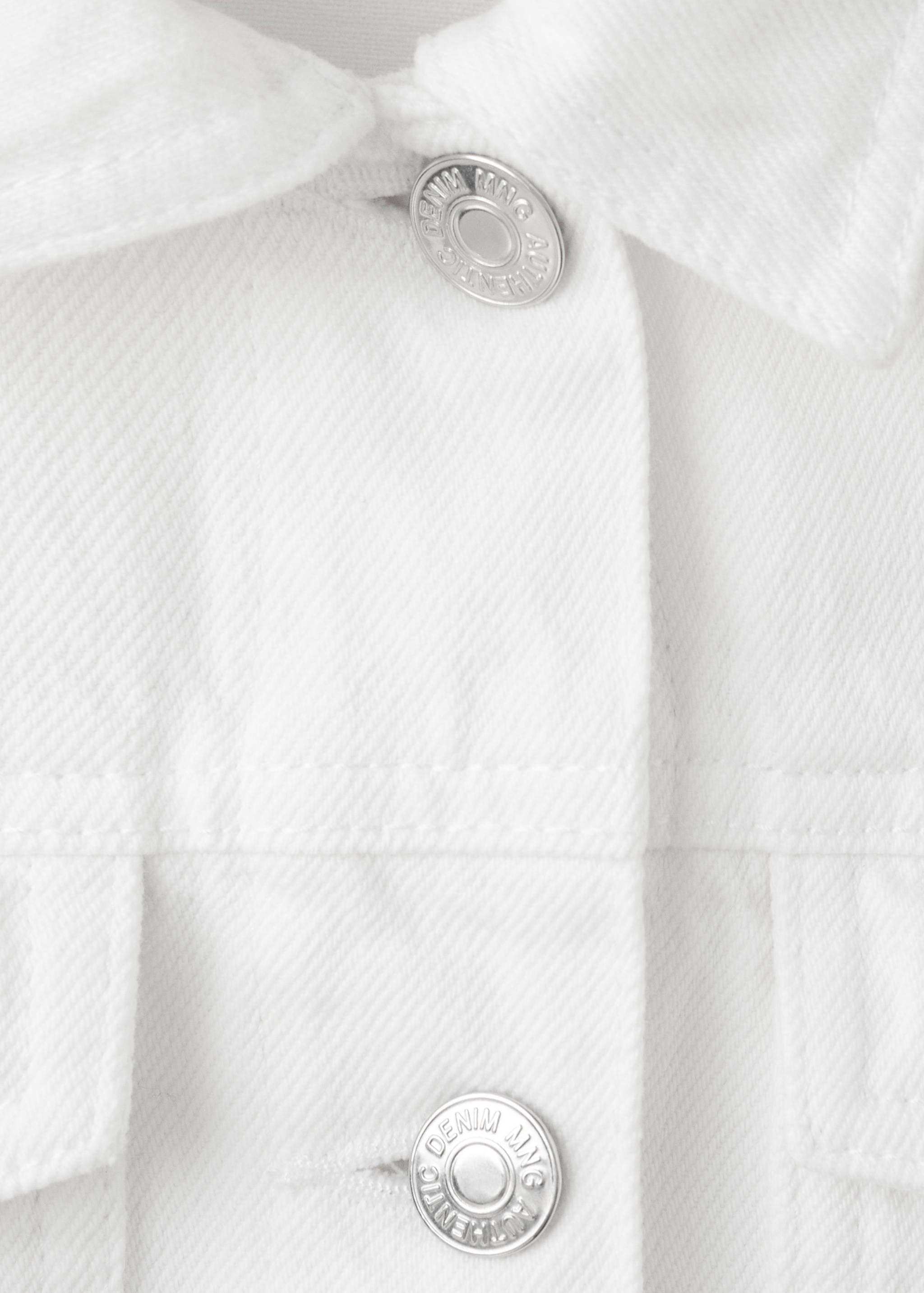 Spijkerjack met zakken - Detail van het artikel 8