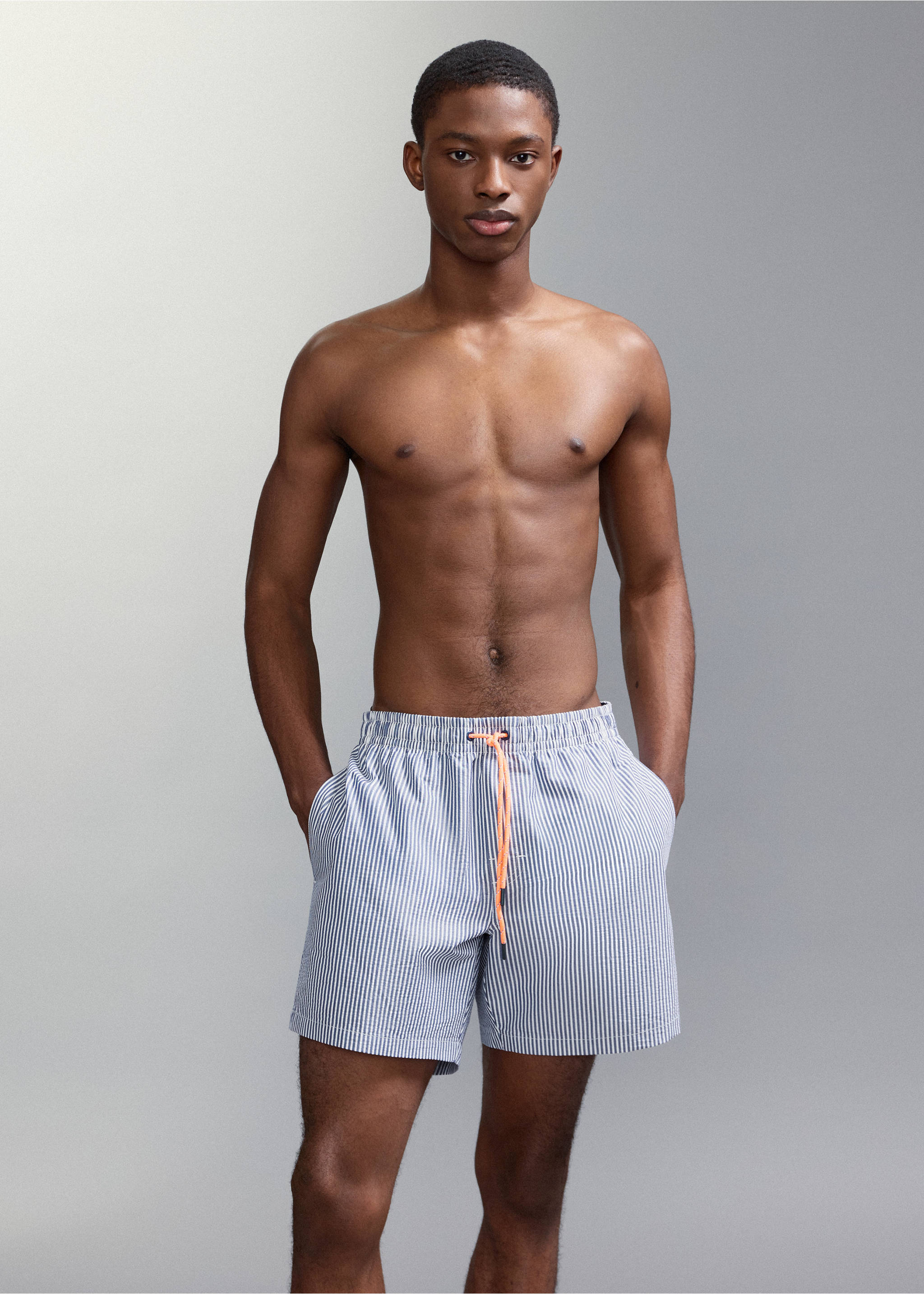 Seersucker striped swimsuit - Details of the article 1, Navy. Ref: 27035987-00.