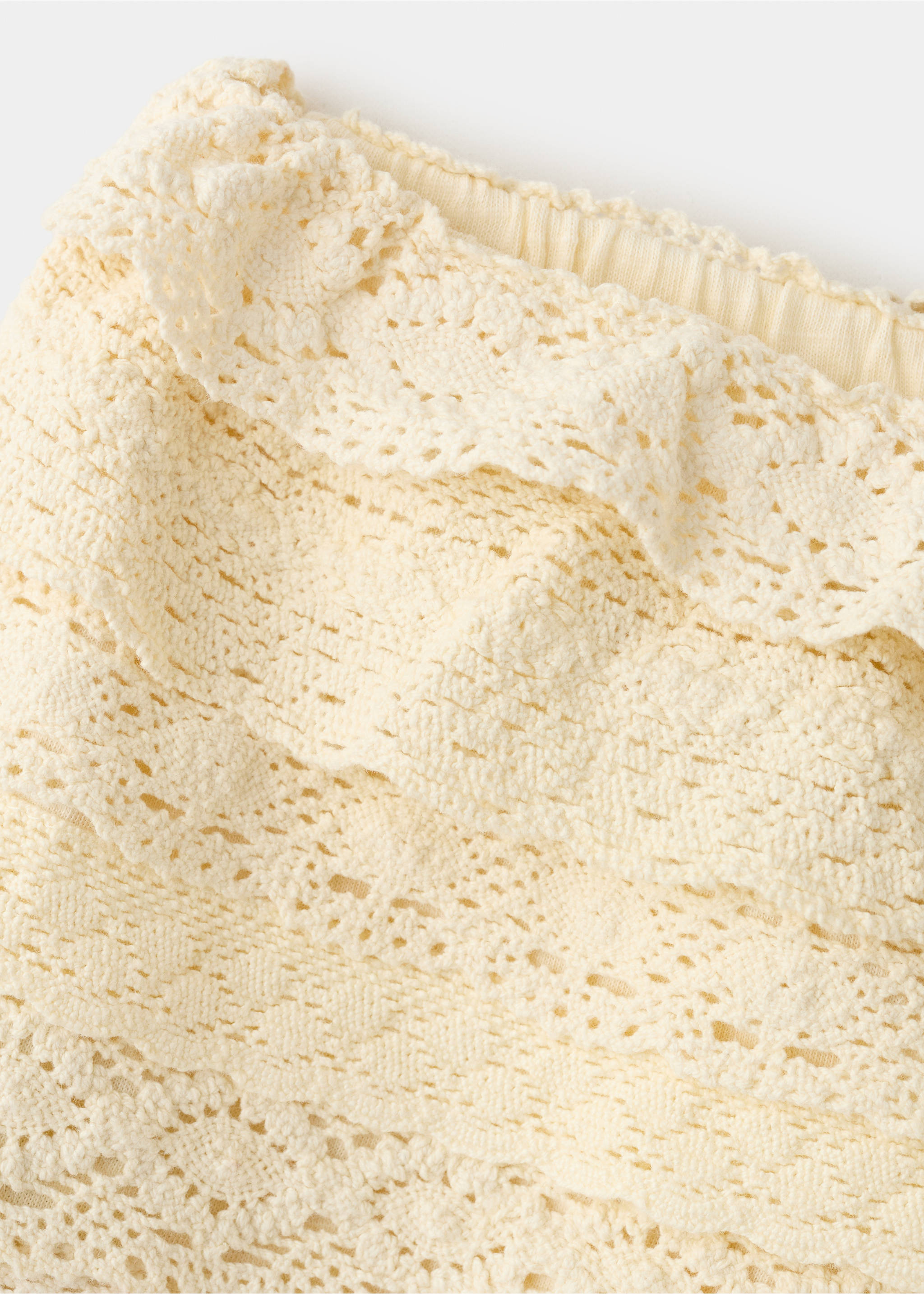 Crochet shorts with ruffles - Details of the article 0, Pastel Yellow. Ref: 27036339-00.