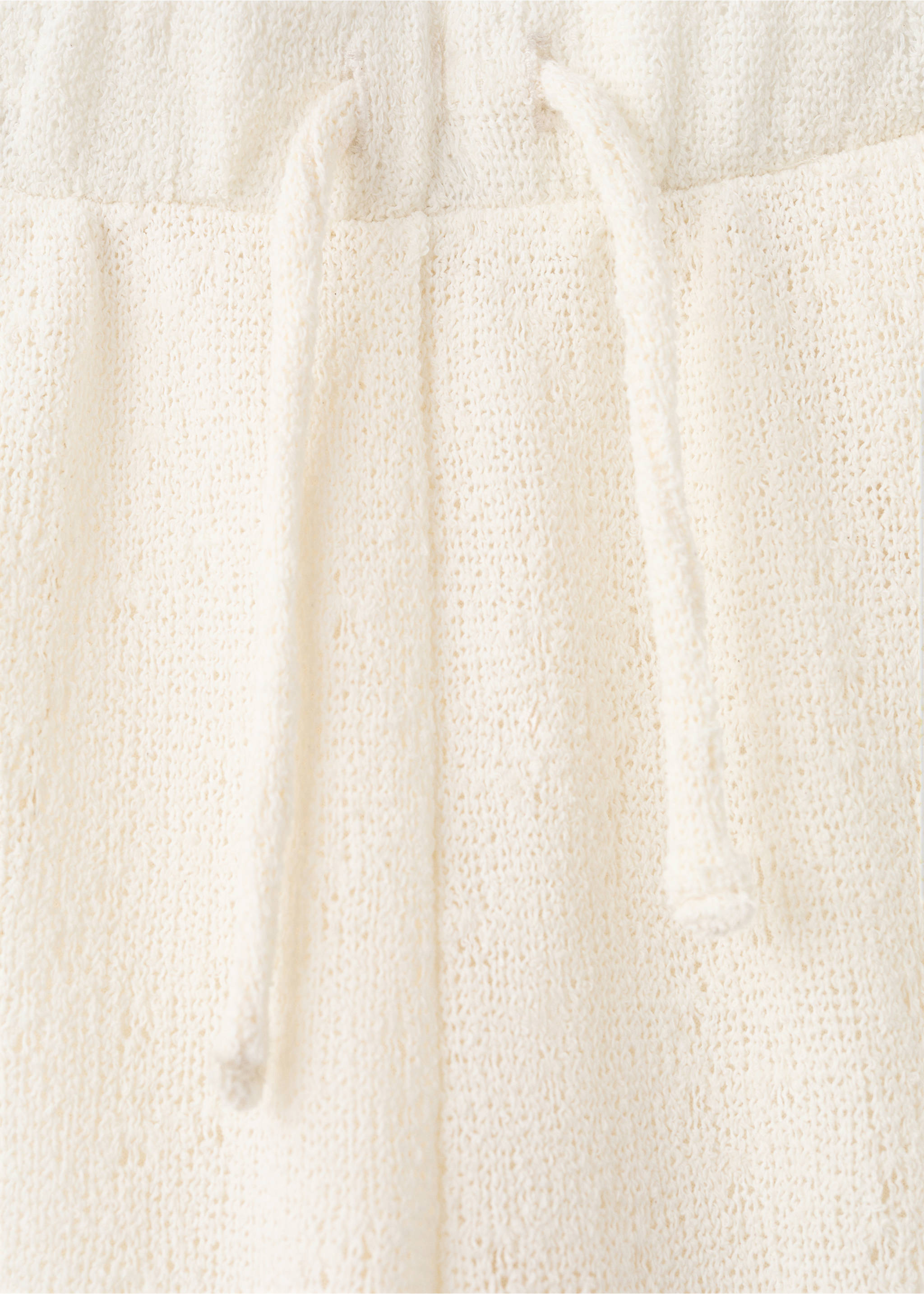 Straight knitted trousers - Details of the article 8, Ecru. Ref: 27036351-00.