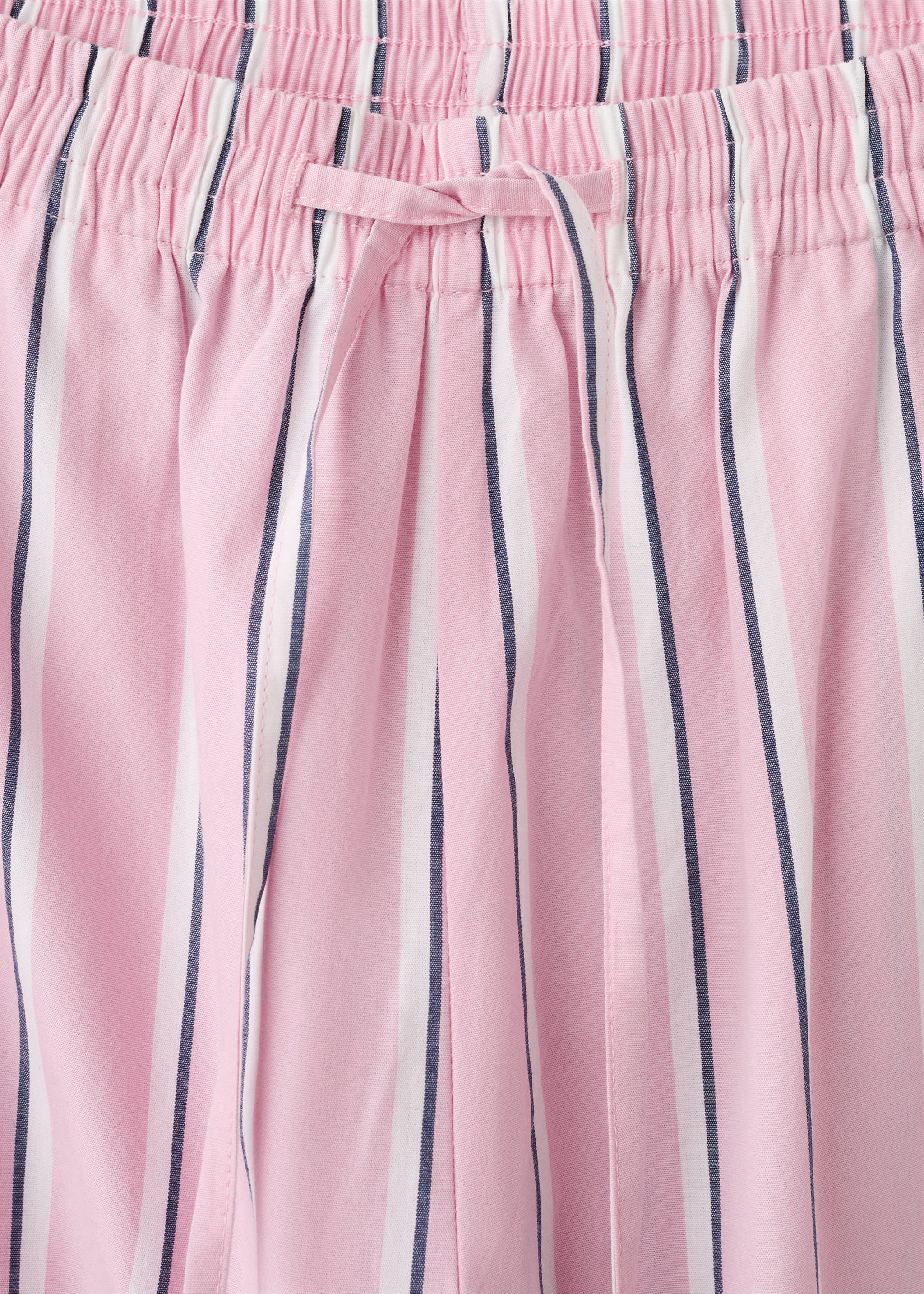 Striped trousers with scalloped details - Details of the article 8, Pastel Pink. Ref: 27036730-00.