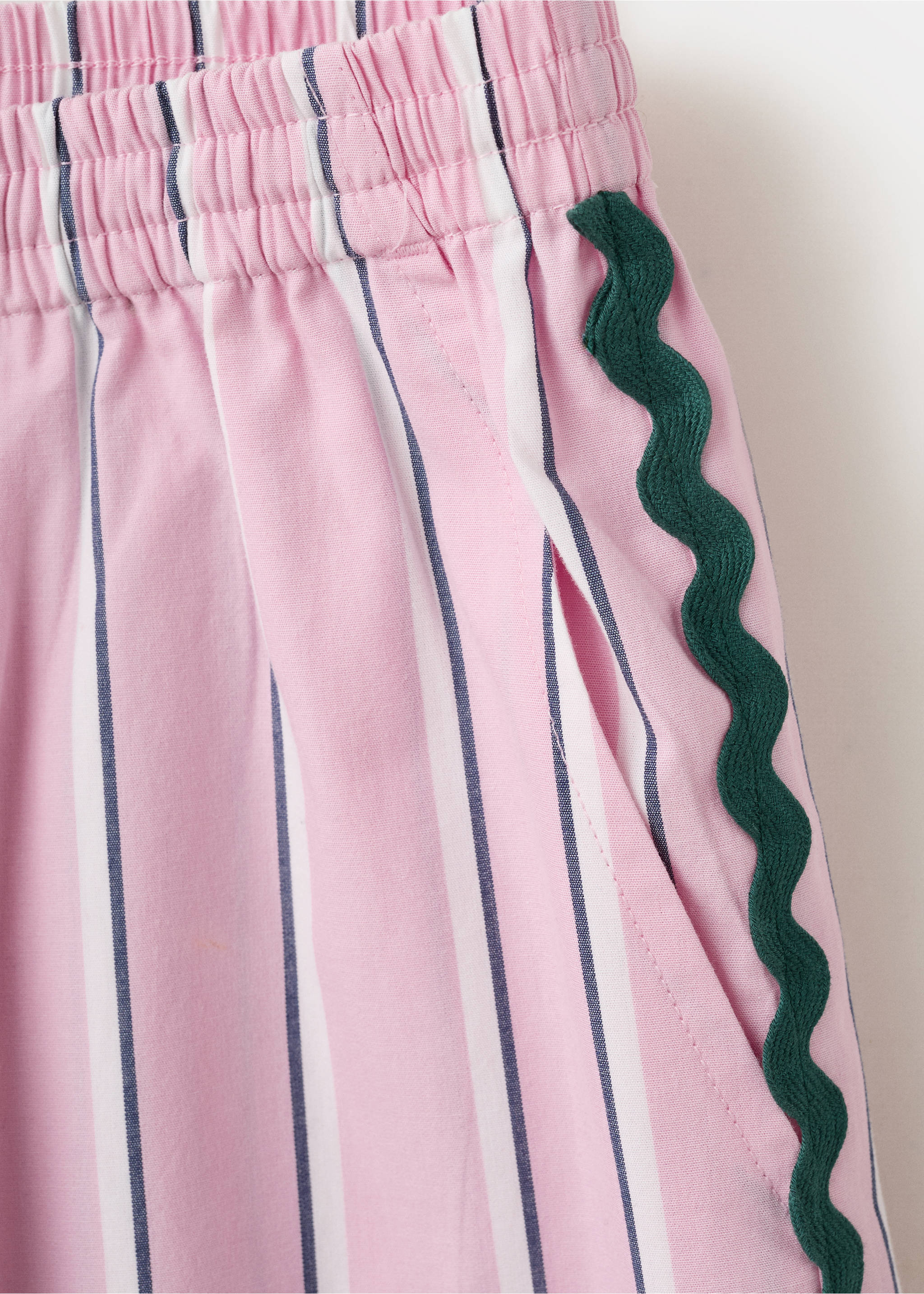 Striped trousers with scalloped details - Details of the article 0, Pastel Pink. Ref: 27036730-00.