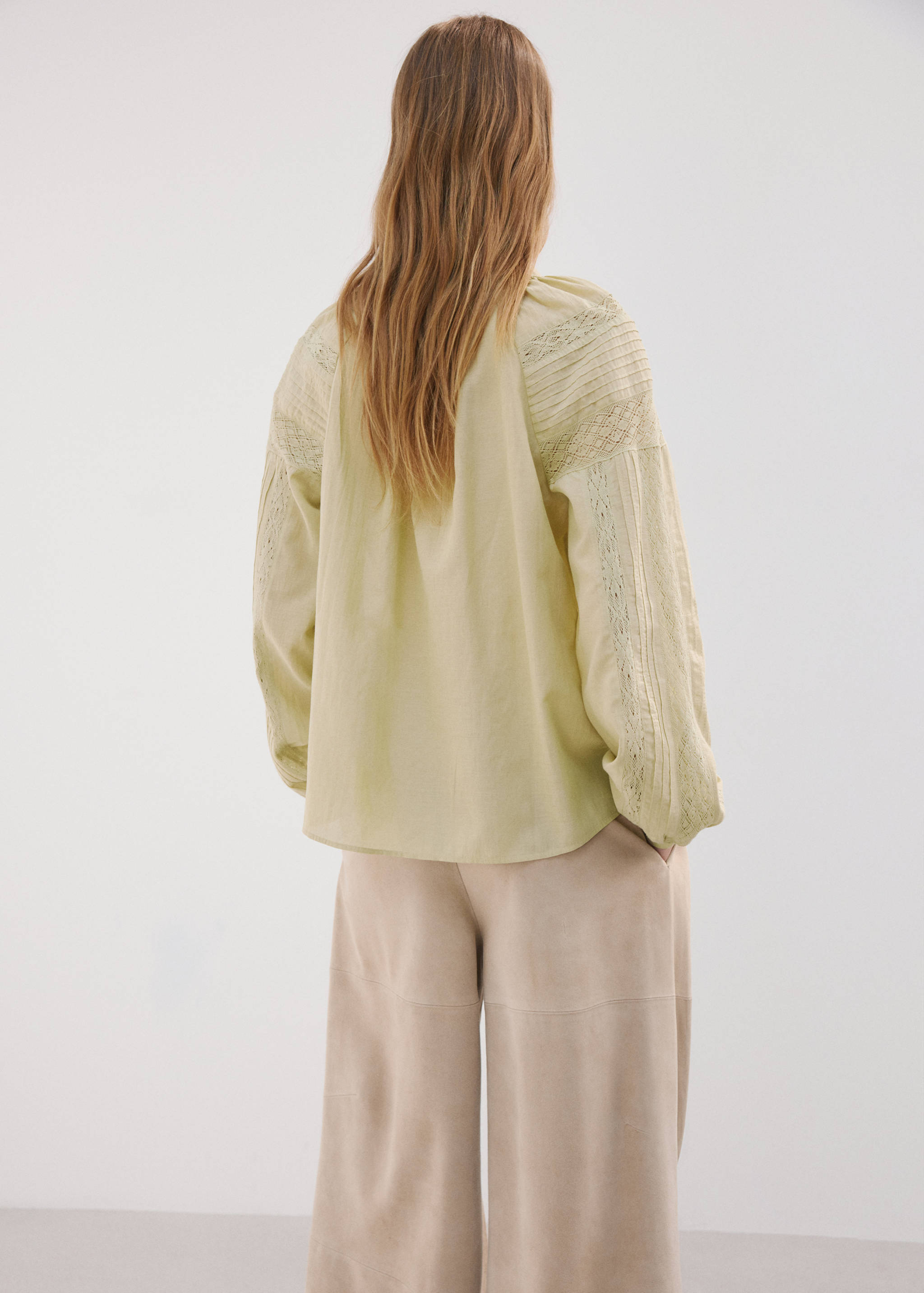 Embroidered openwork blouse - Reverse of the article