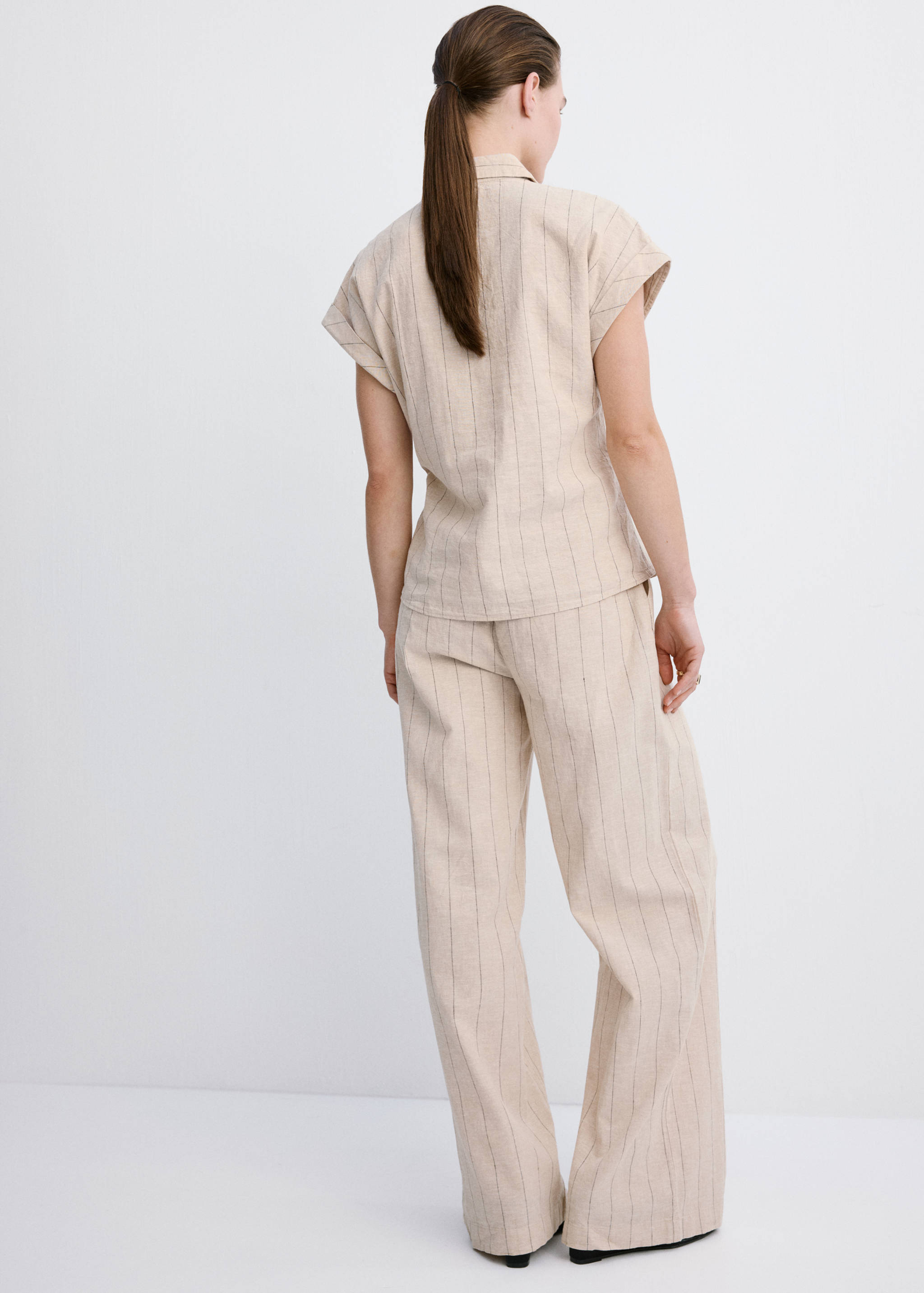 Pinstripe linen trousers - Reverse of the article