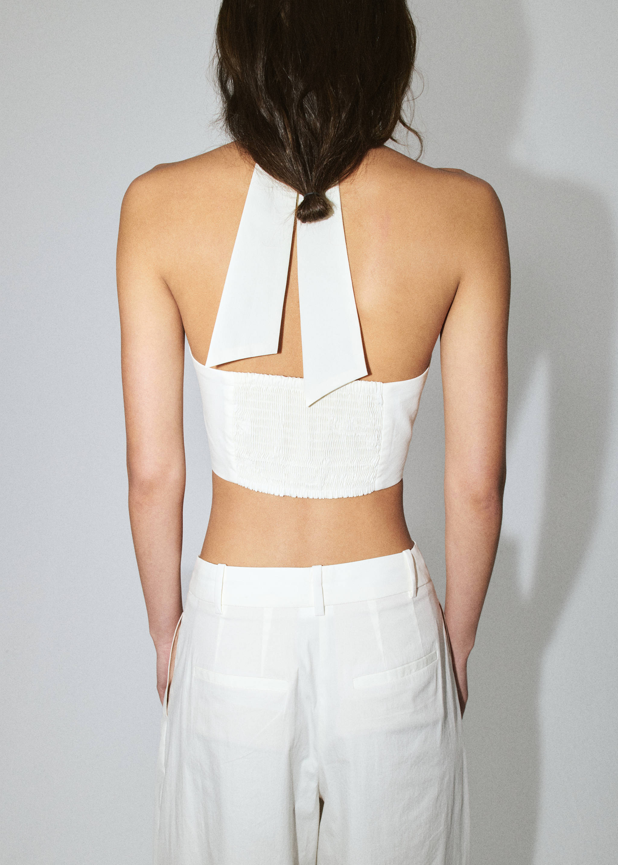 Crop haltertop - Achterkant van het artikel