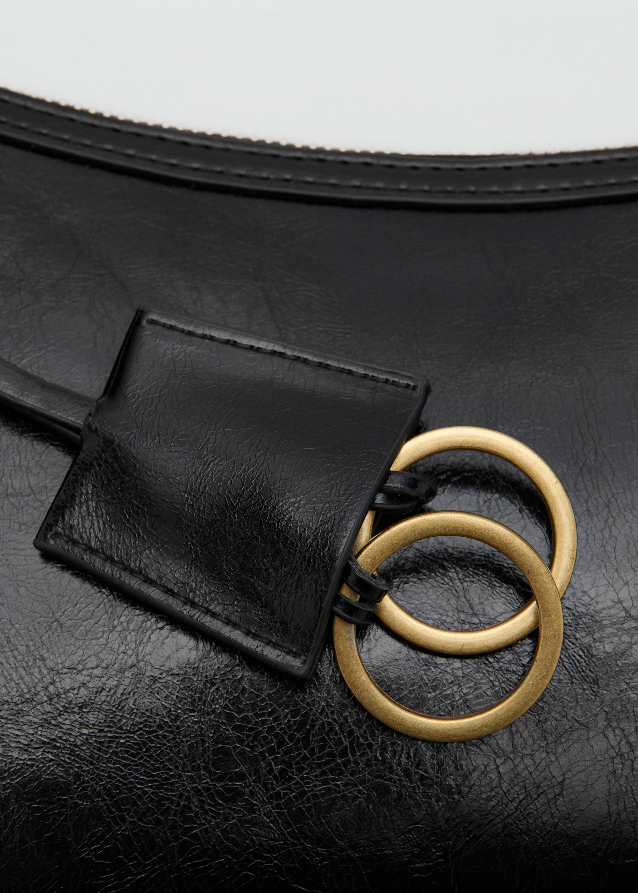 Crossbody bag with charms and rings - Details of the article 1