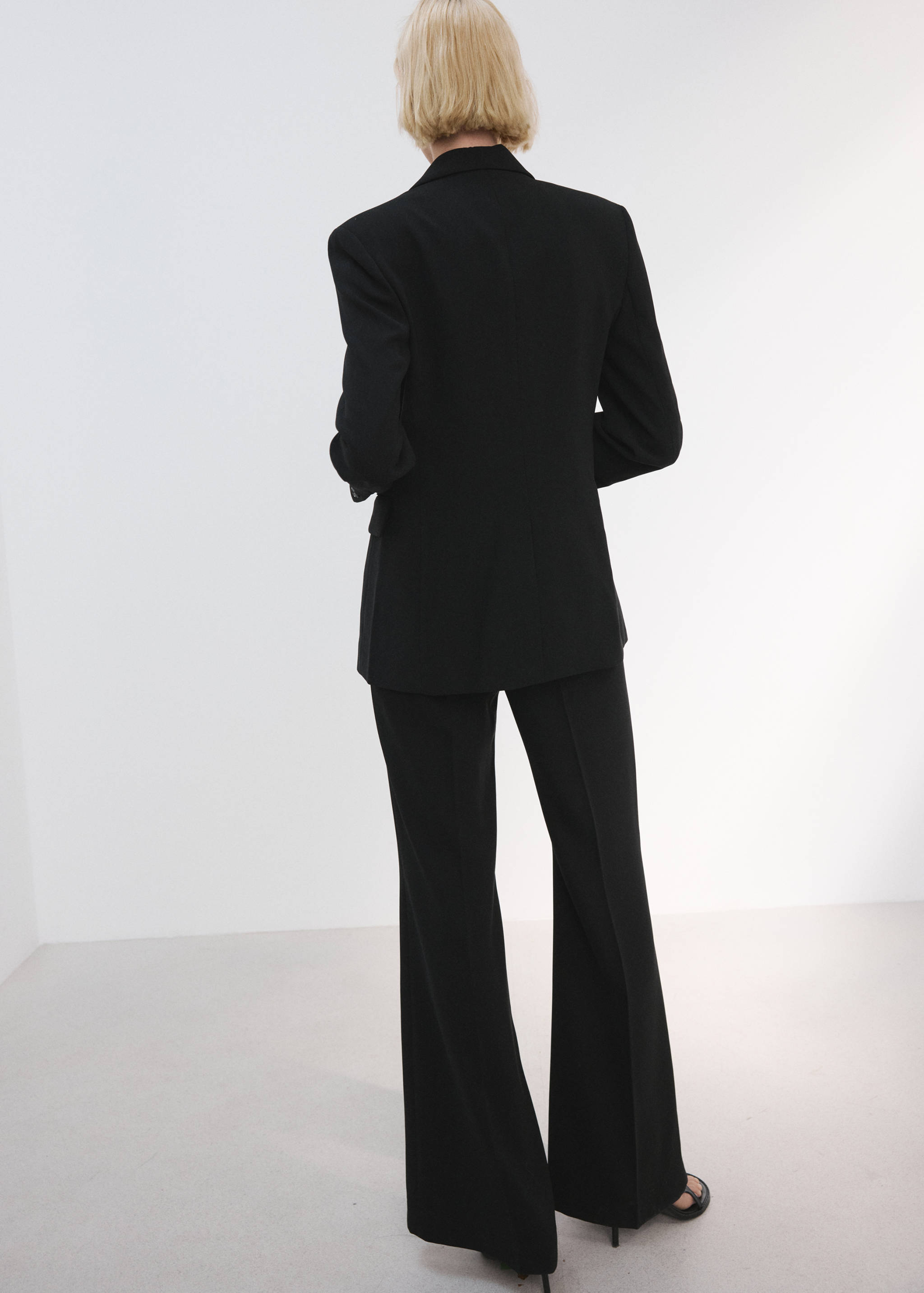 Pantalons vestir tir alt - Revers de l'article