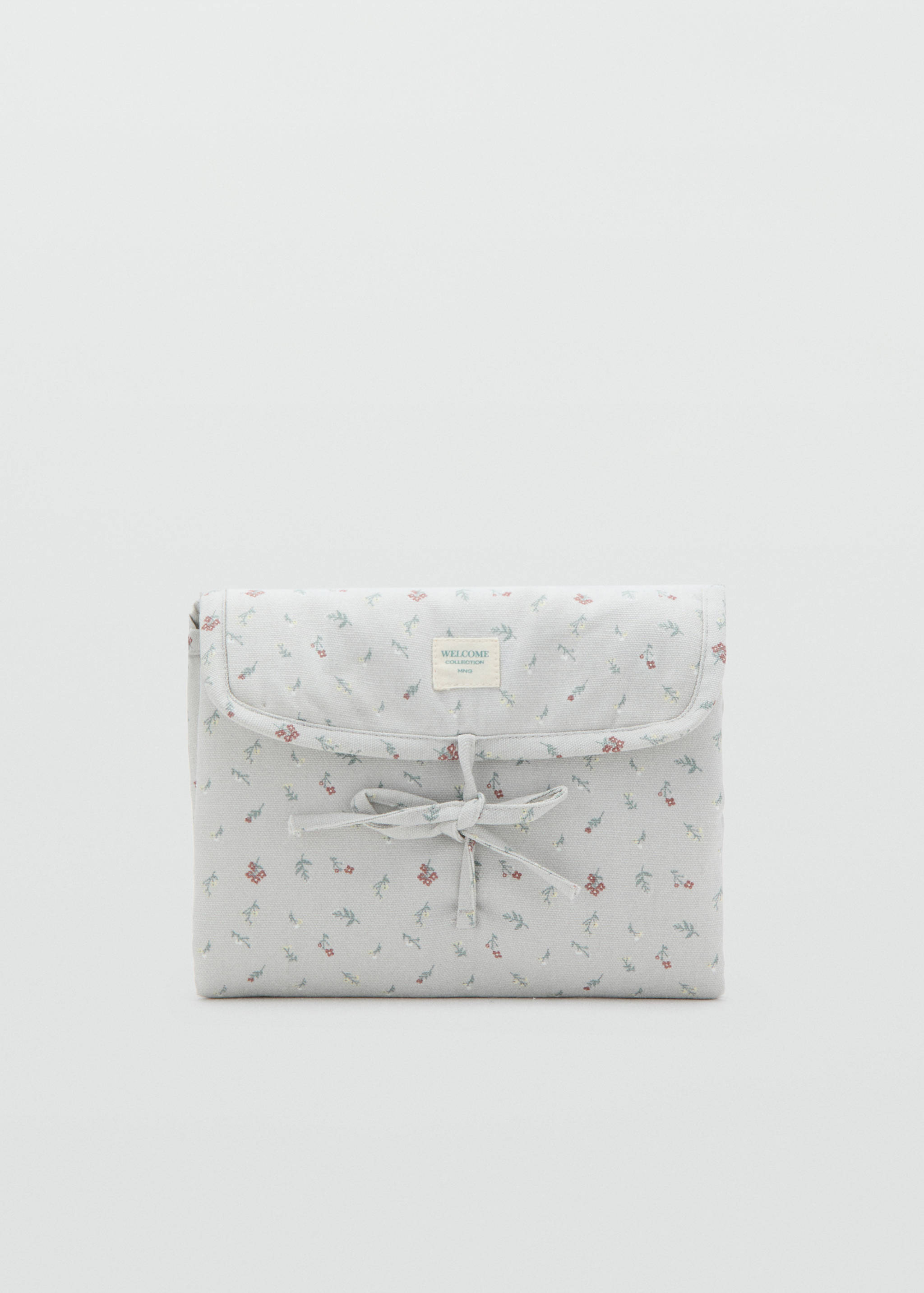 Cambiador de viaje flores - Artículo sin modelo