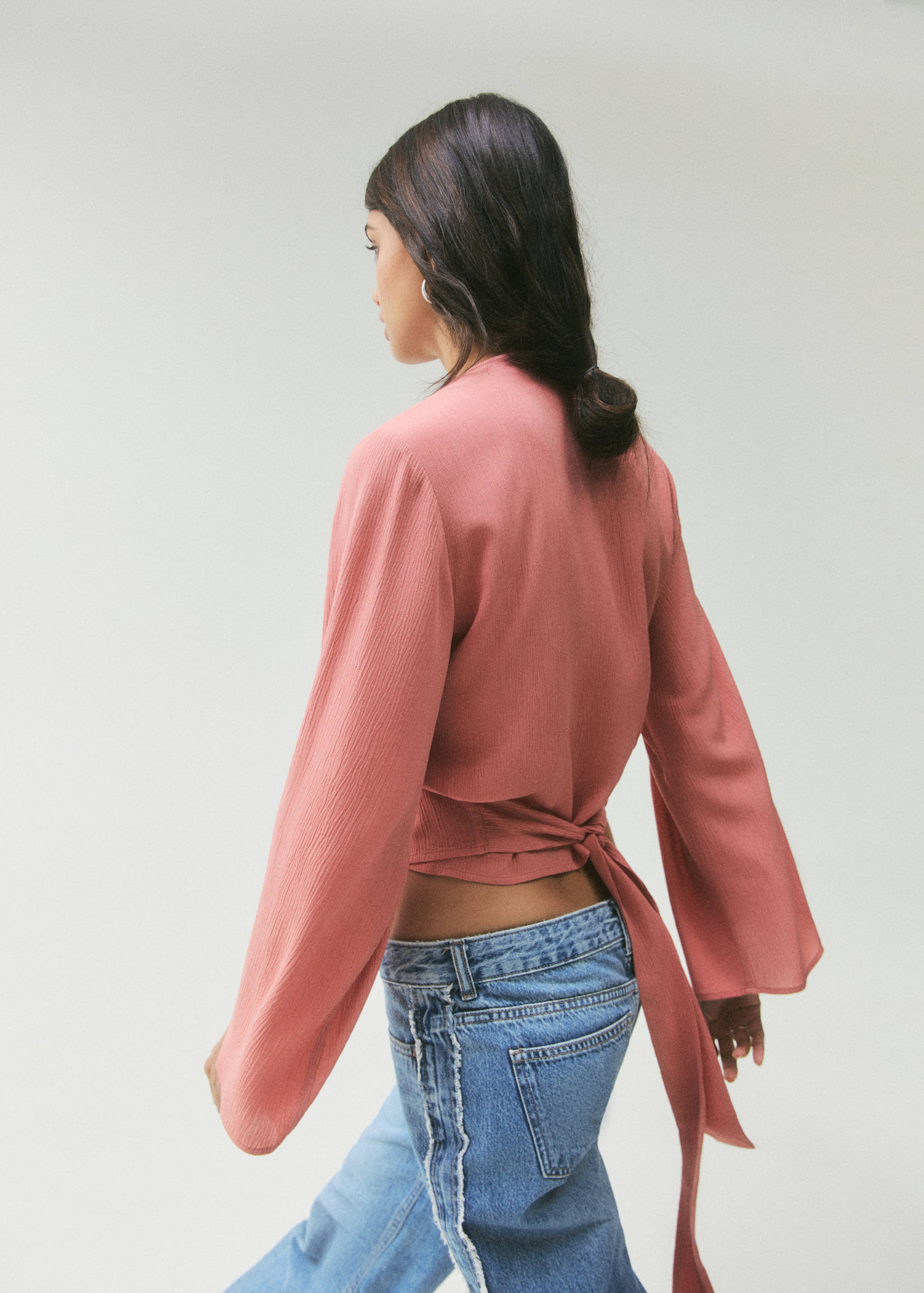 Brusa creuada llaç - Revers de l'article