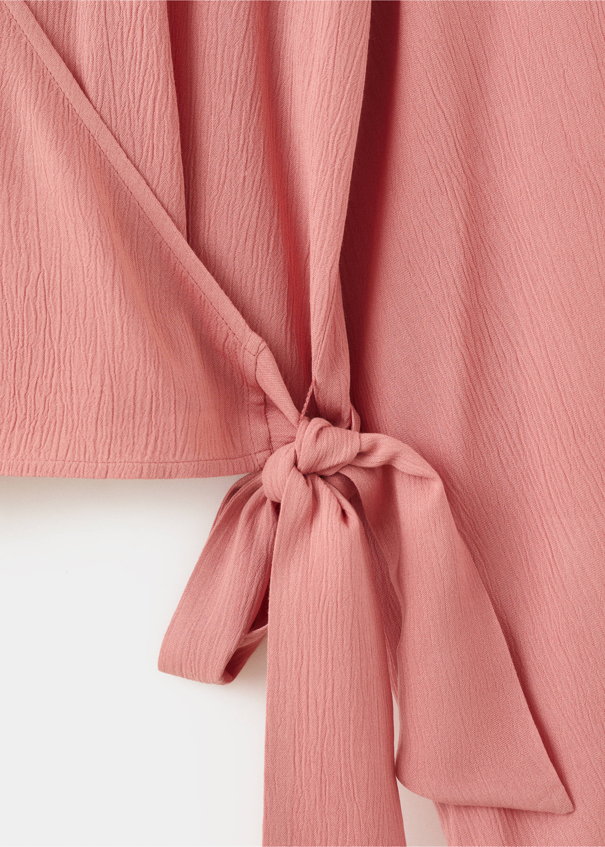 Brusa creuada llaç - Detall de l'article 8, Taronja. Ref: 27043730-00.