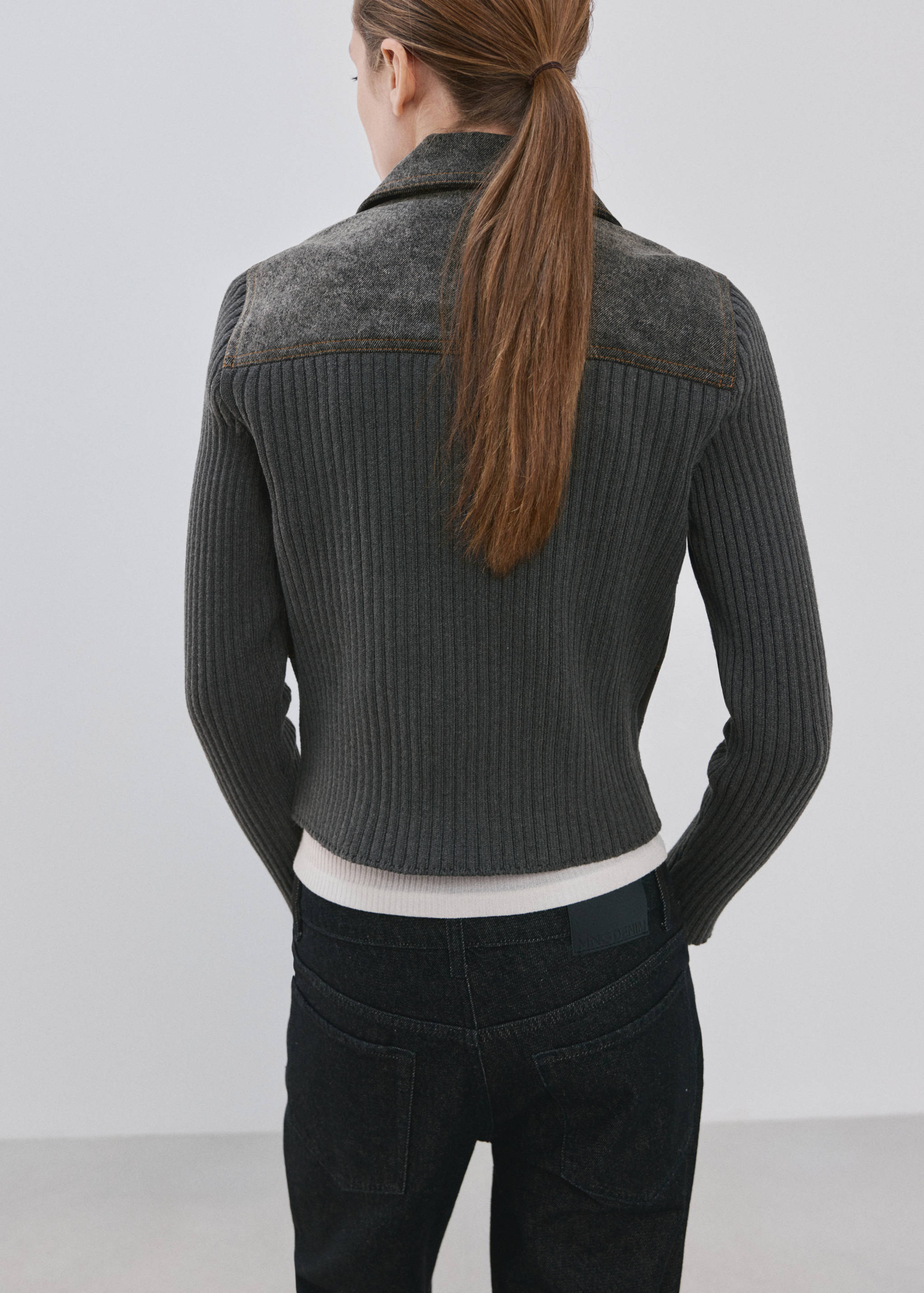 Knitted jacket with combined fabrics - Reverse of the article