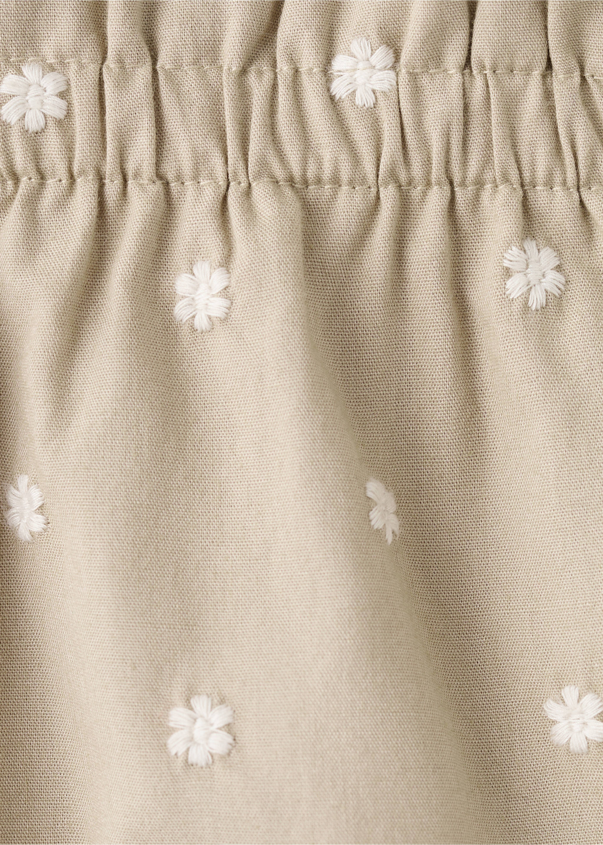 Embroidered floral paperbag trousers - Details of the article 8, Sand. Ref: 27044433-00.