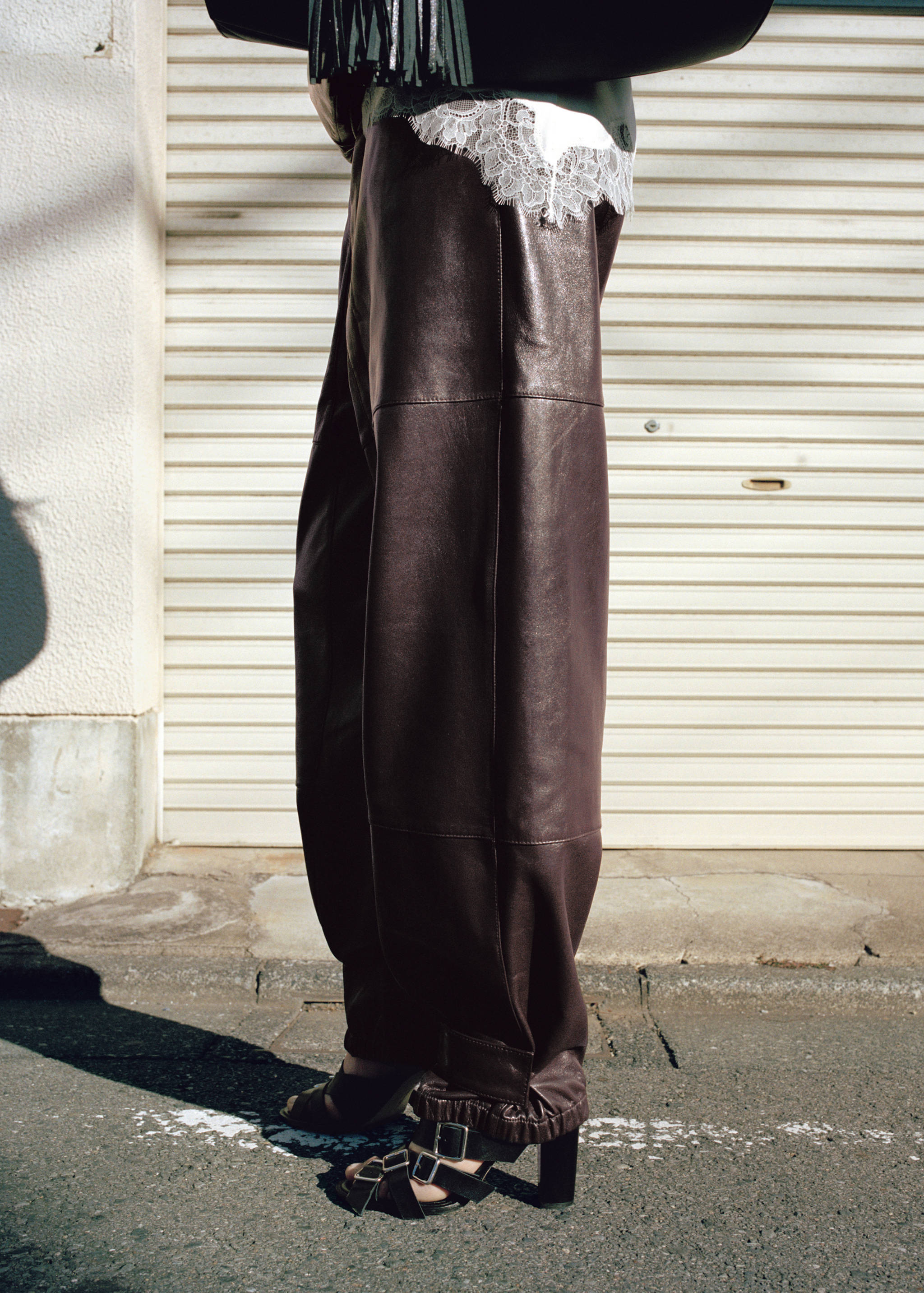 Buttoned hem leather trousers - Medium plane