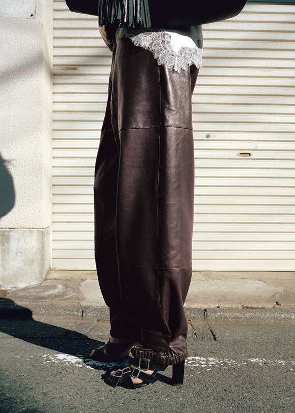 Buttoned hem leather trousers — Burgundy
