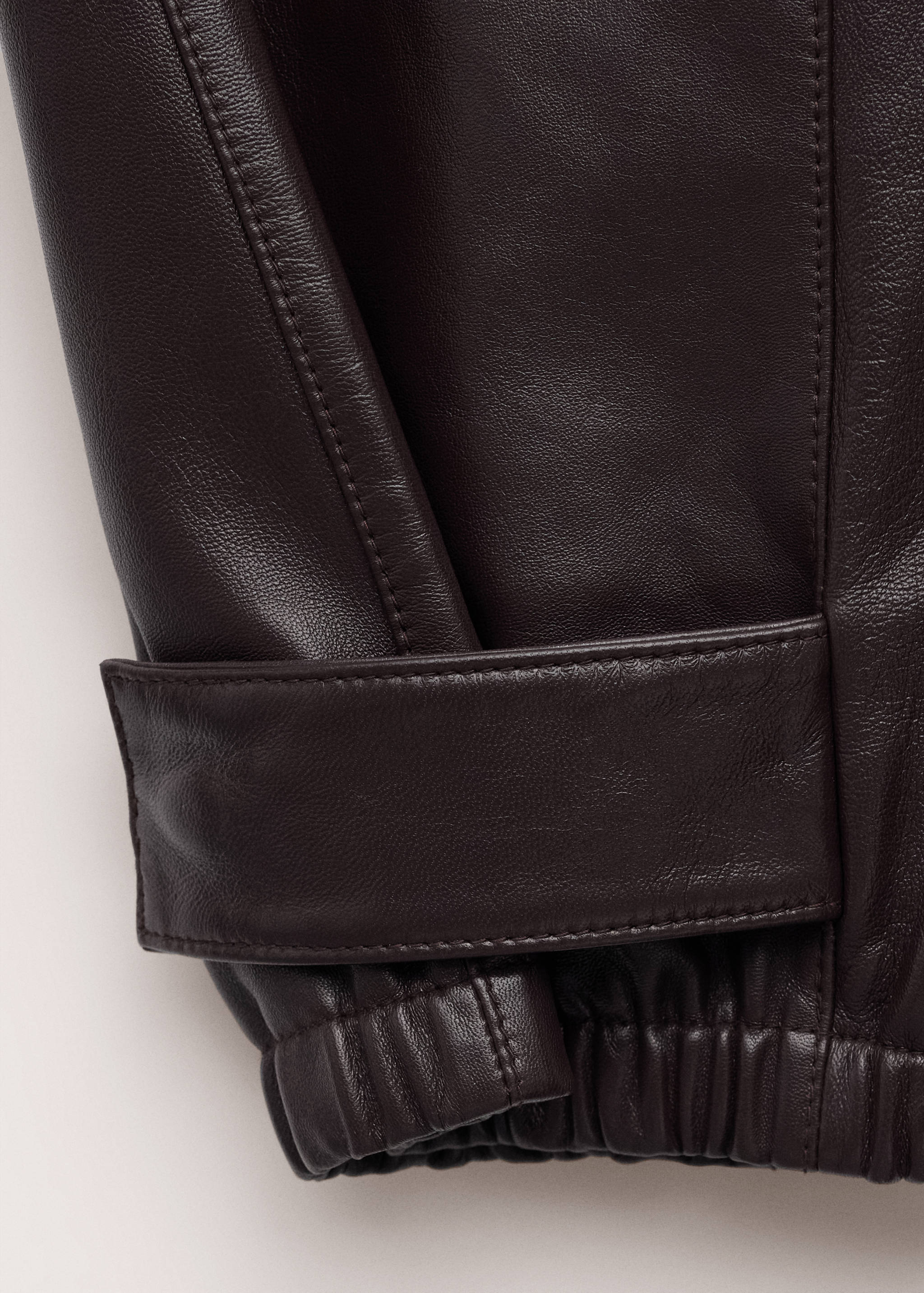 Buttoned hem leather trousers - Details of the article 0