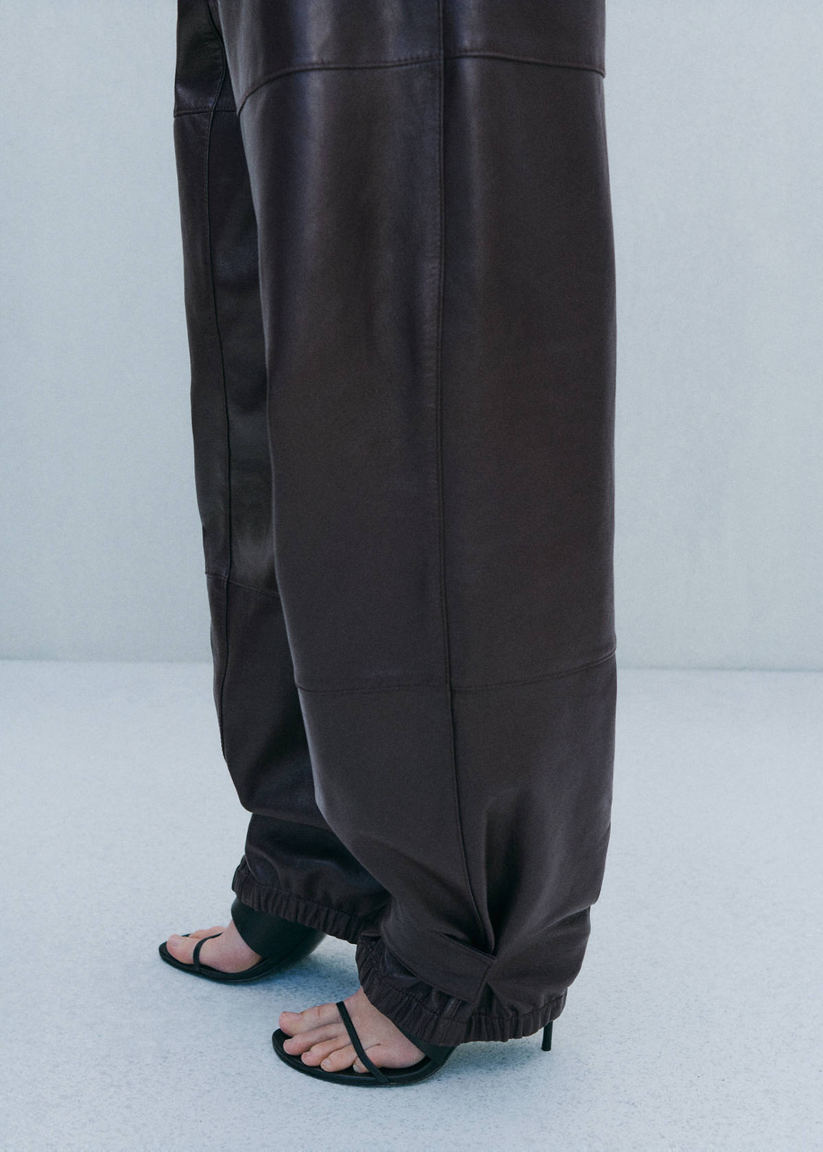 Buttoned hem leather trousers — Burgundy