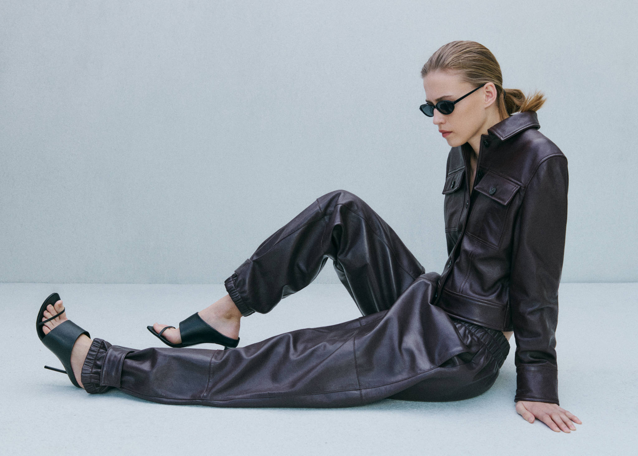 Buttoned hem leather trousers - Panoramic plane