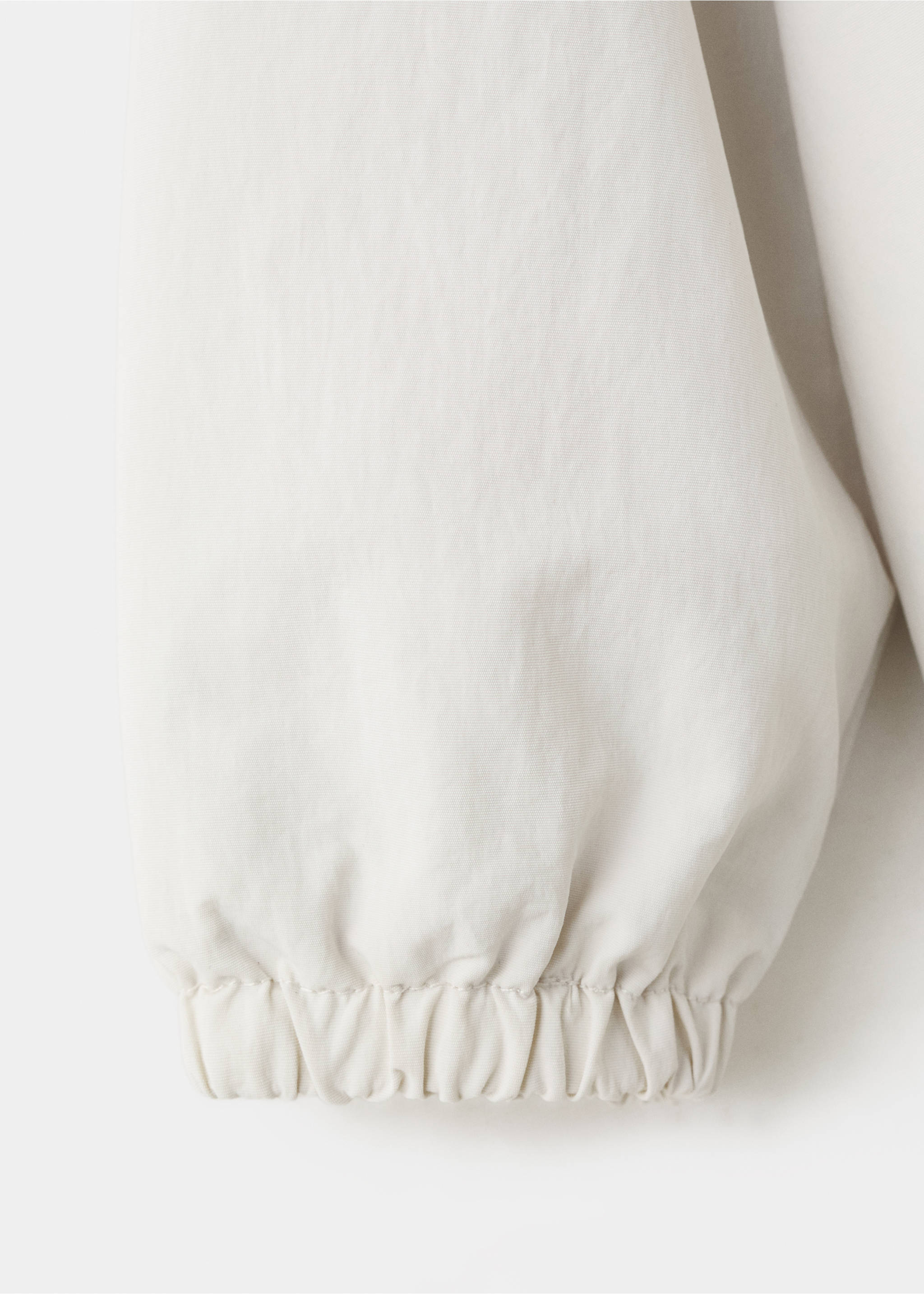 Chaqueta impermeable capucha - Detalle del artículo 8, Crudo. Ref: 27045143-00.