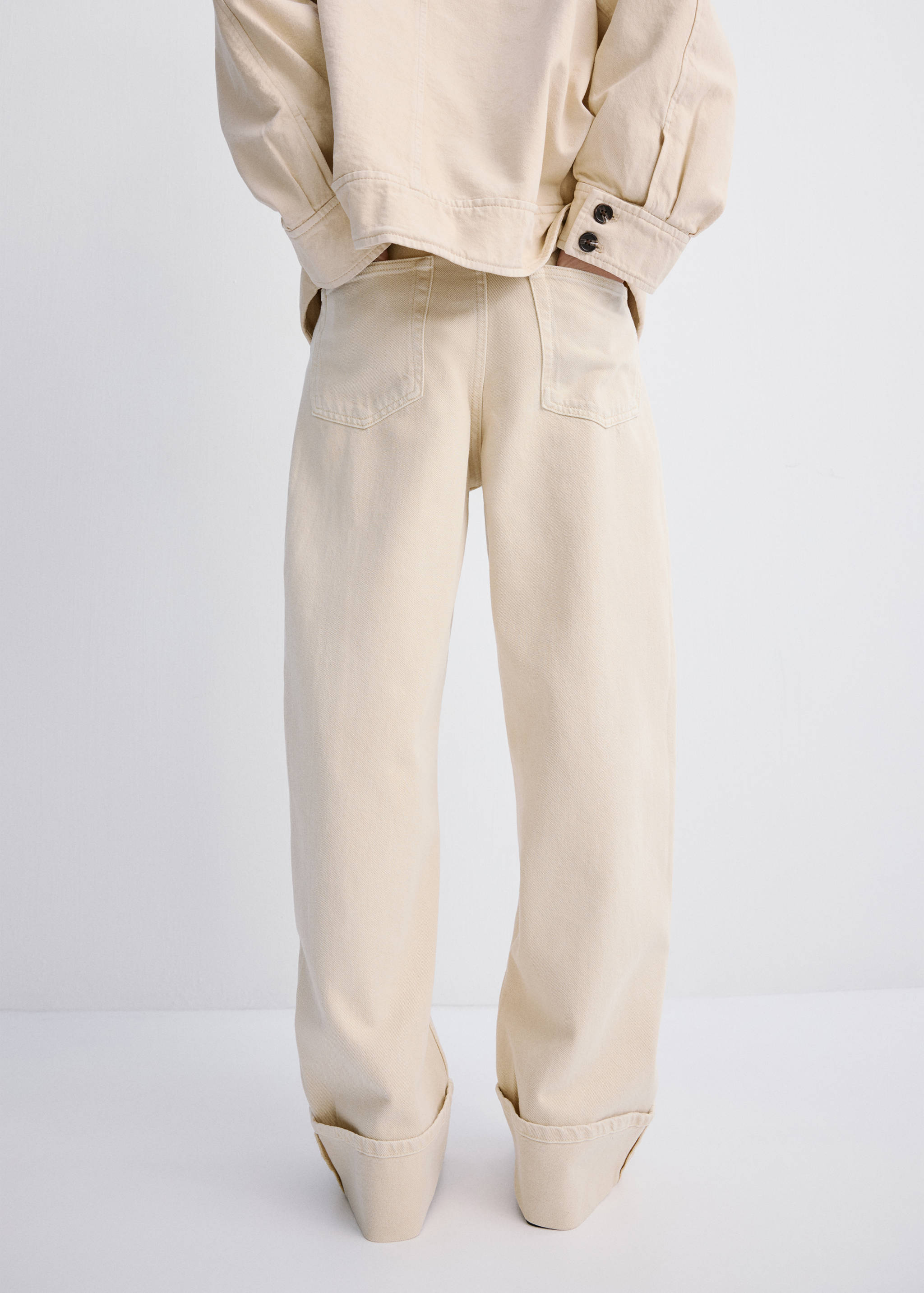 Balloon jeans with rolled-up hem - Reverse of the article