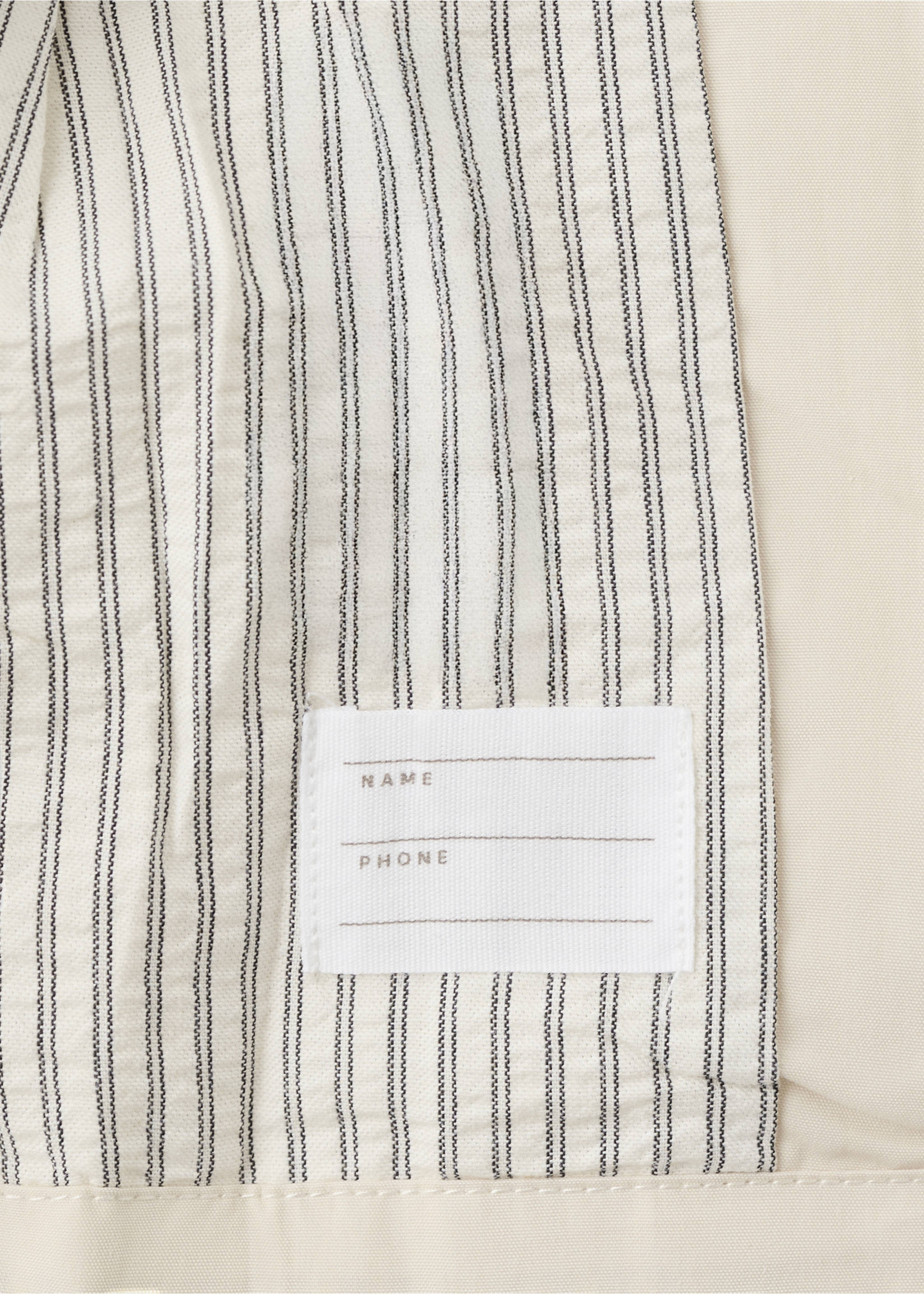 Veste cirée avec nœud - Détail de l'article 0, Écru. Ref: 27045929-00.