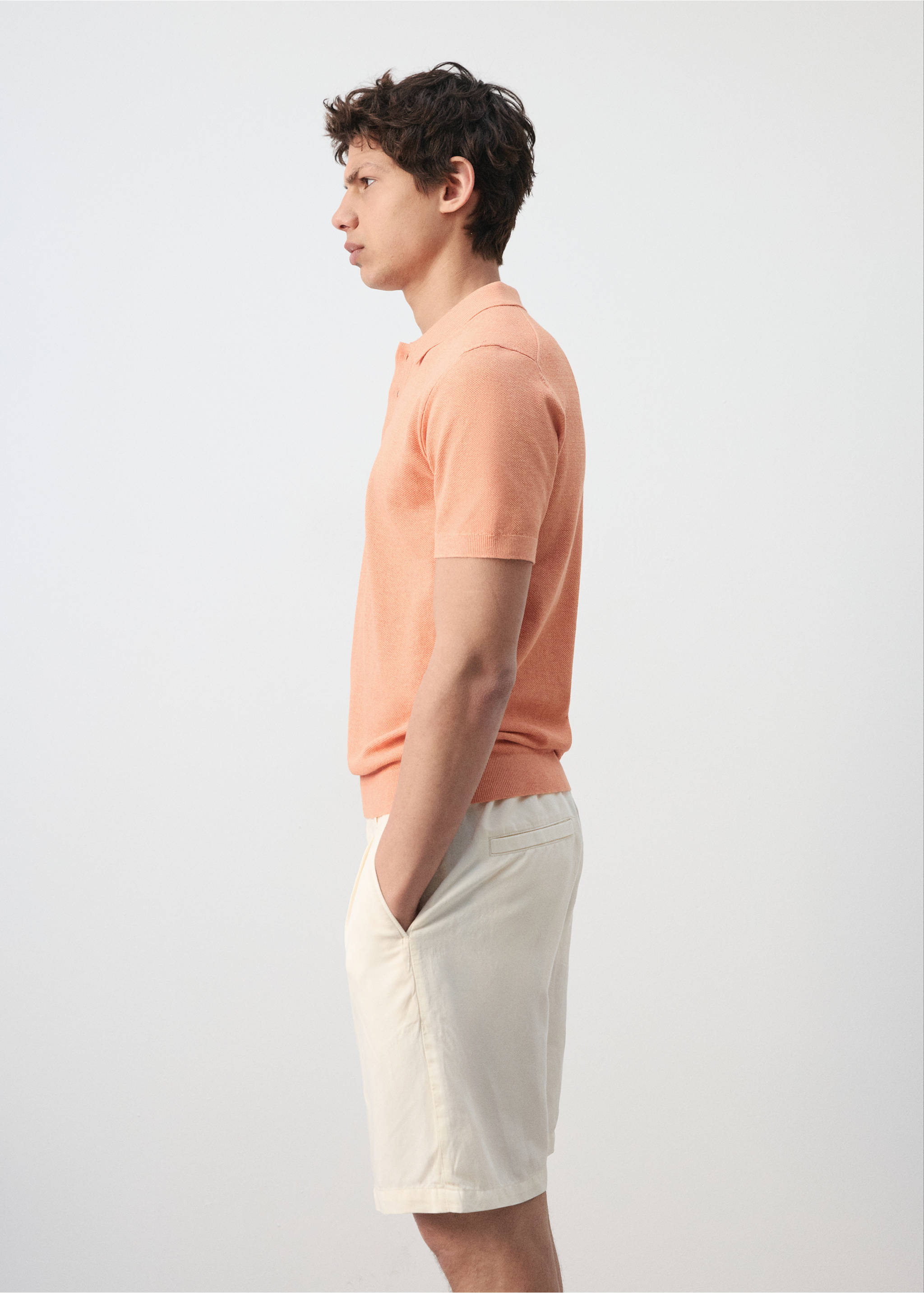 Fine knit polo shirt with microstructure - Details of the article 2, Dark Orange. Ref: 27045944-00.