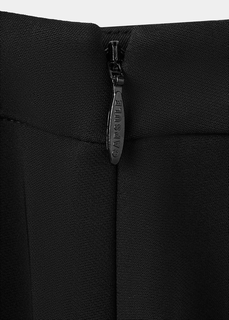 High-waist flared trousers — Black