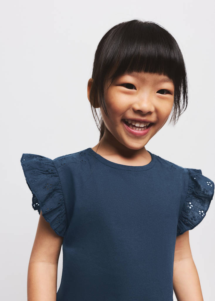 Ruffle top with embroidered details — Navy