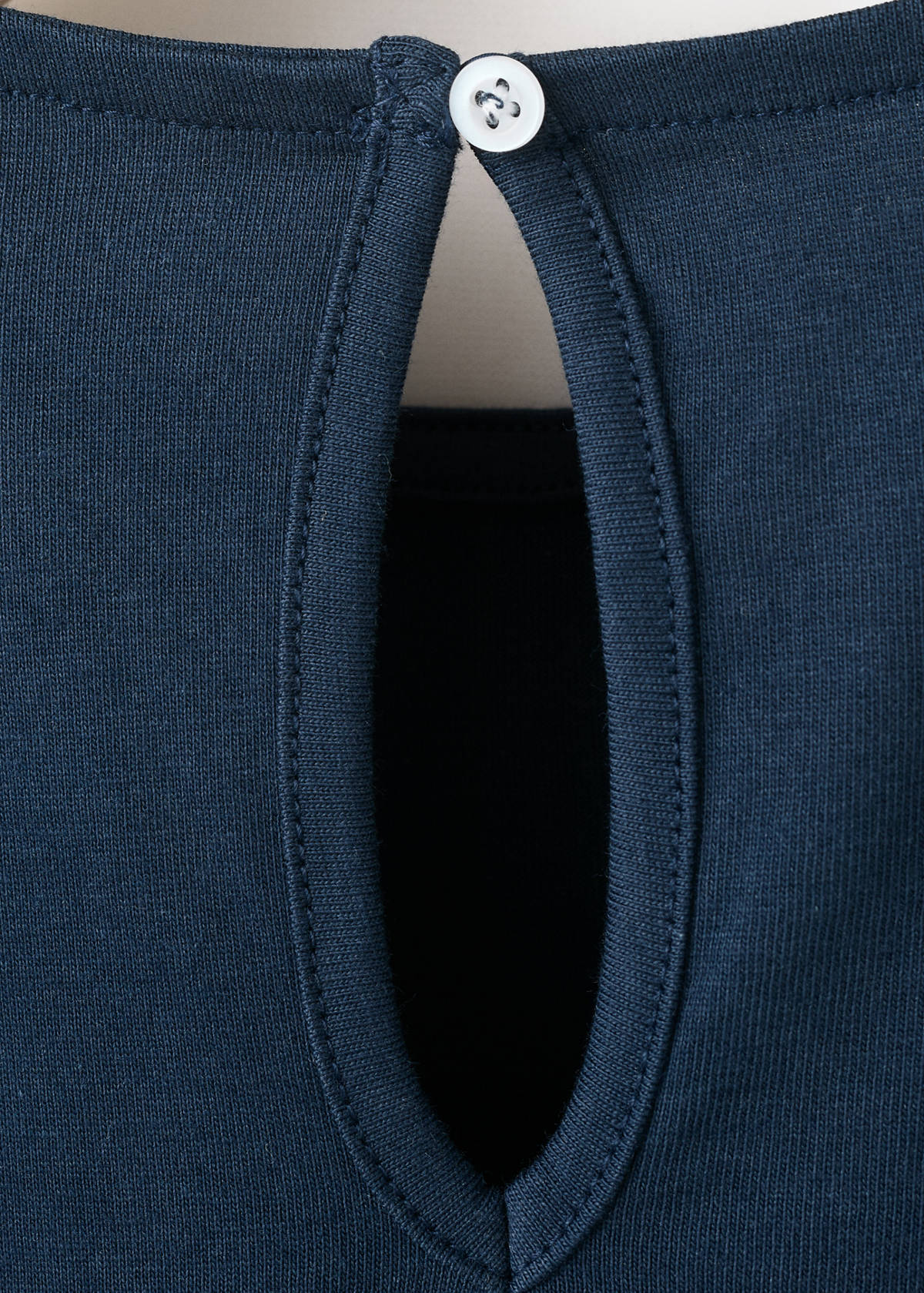 Ruffle top with embroidered details — Navy