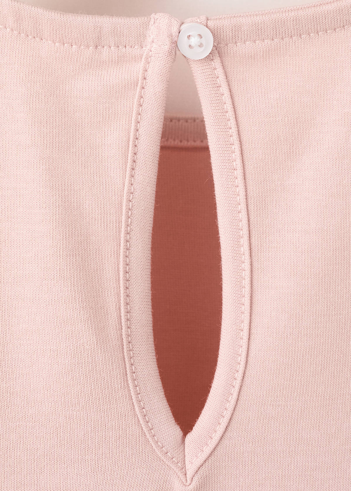 Ruffle top with embroidered details — Pink