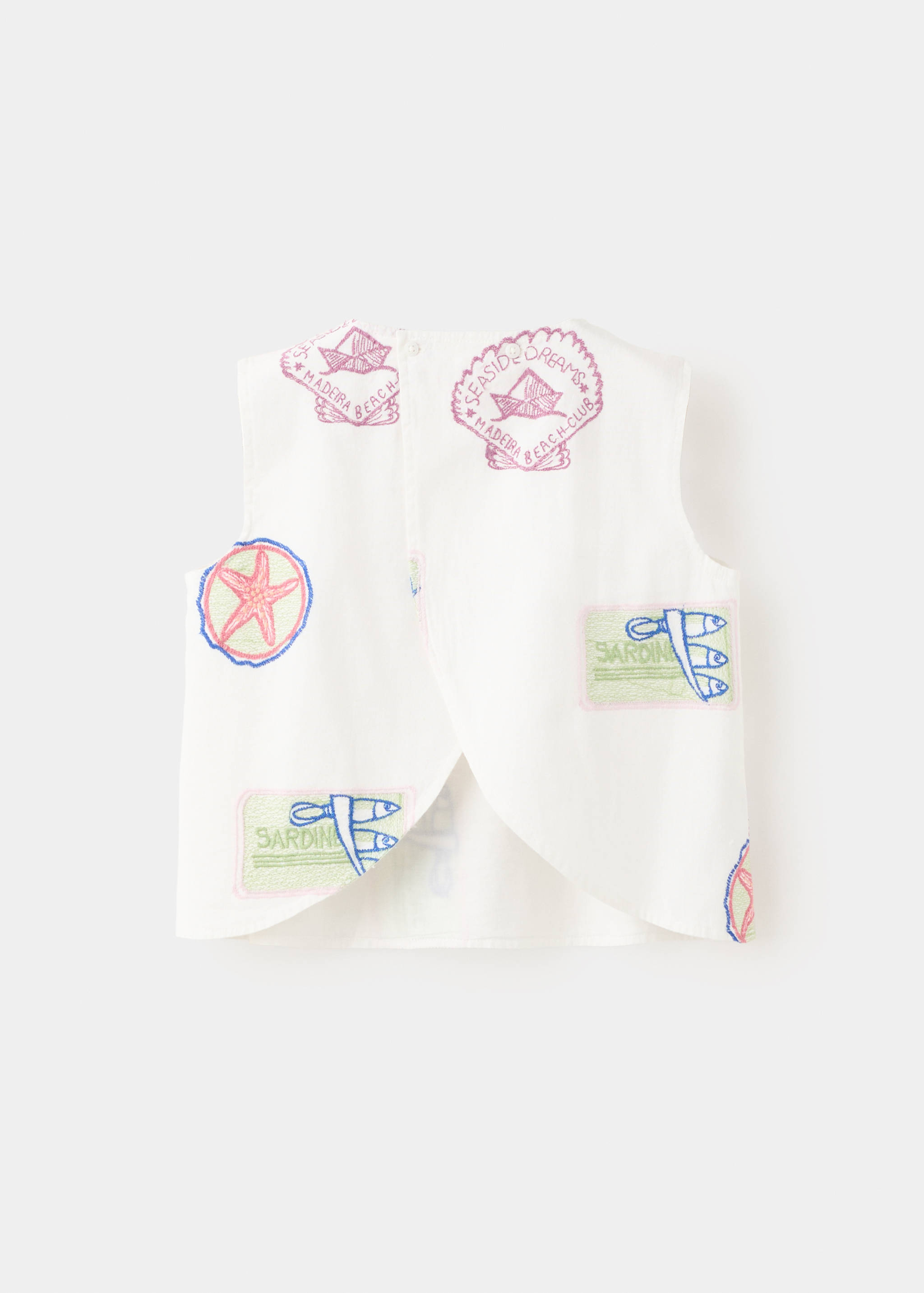 Блузка с вышивкой - Обратная сторона изделия