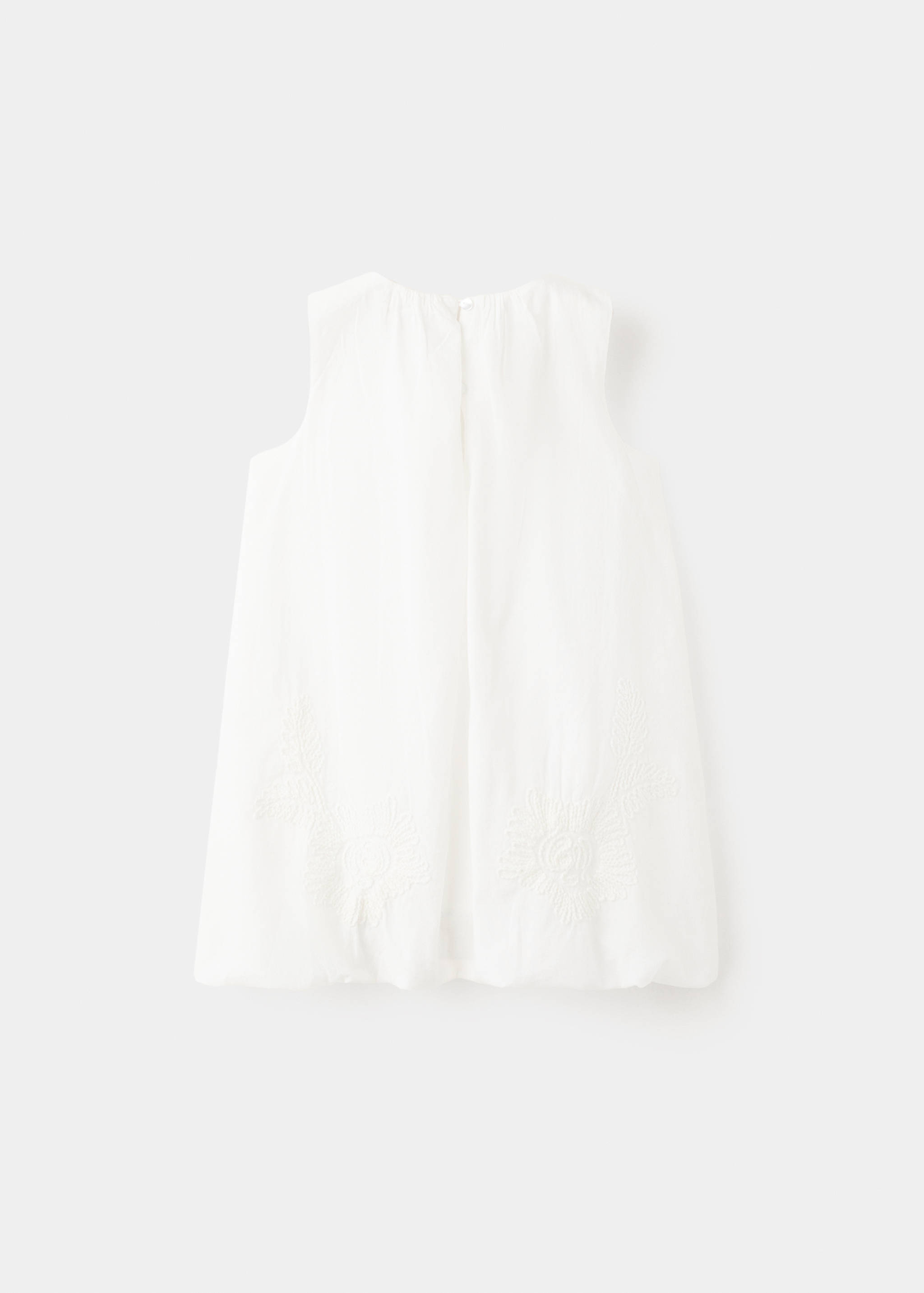 Vestit globus brodat flors - Revers de l'article